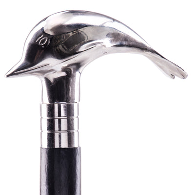 Walking stick with brass knob in the shape of a dolphin