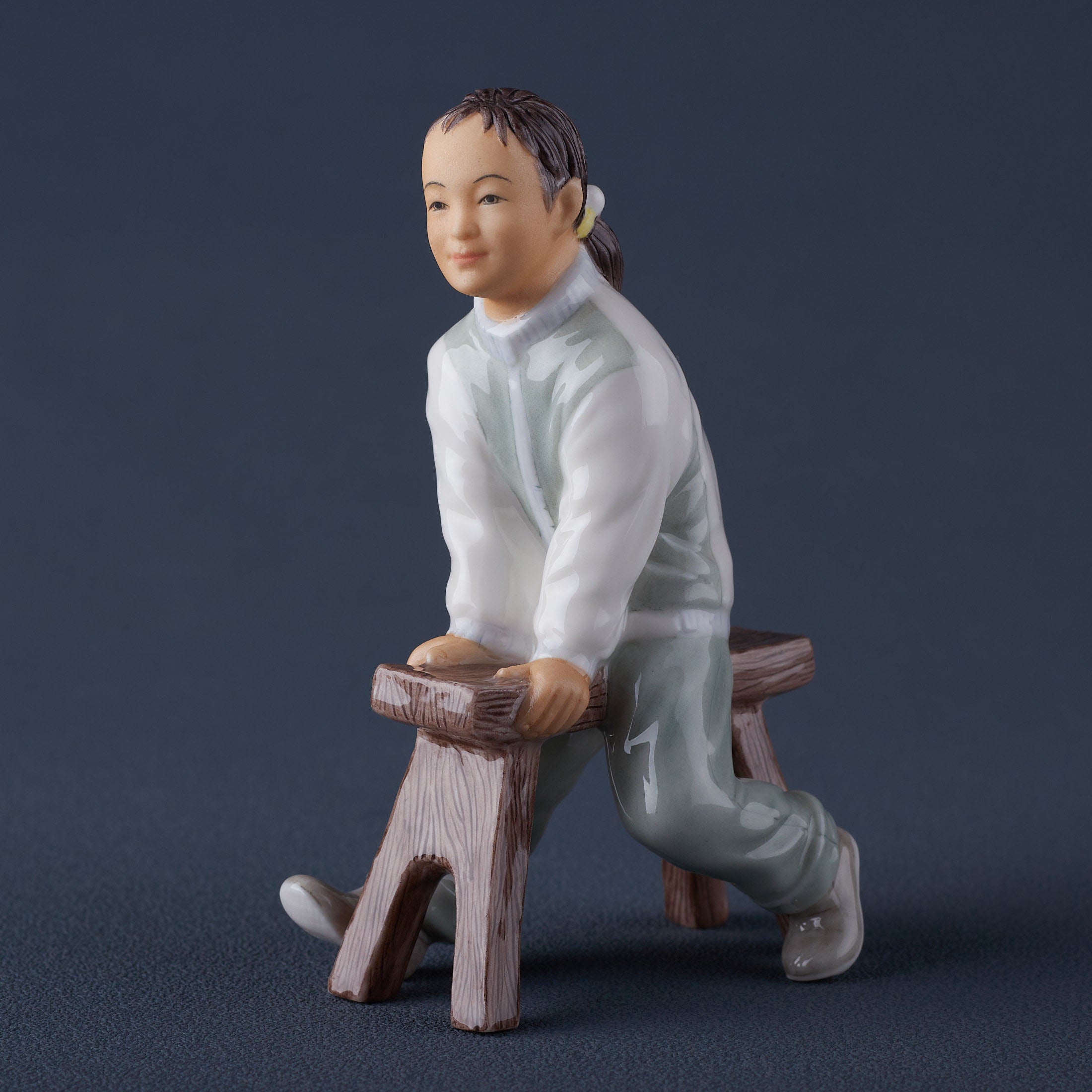 Oriental YouthGirl On Long Stool