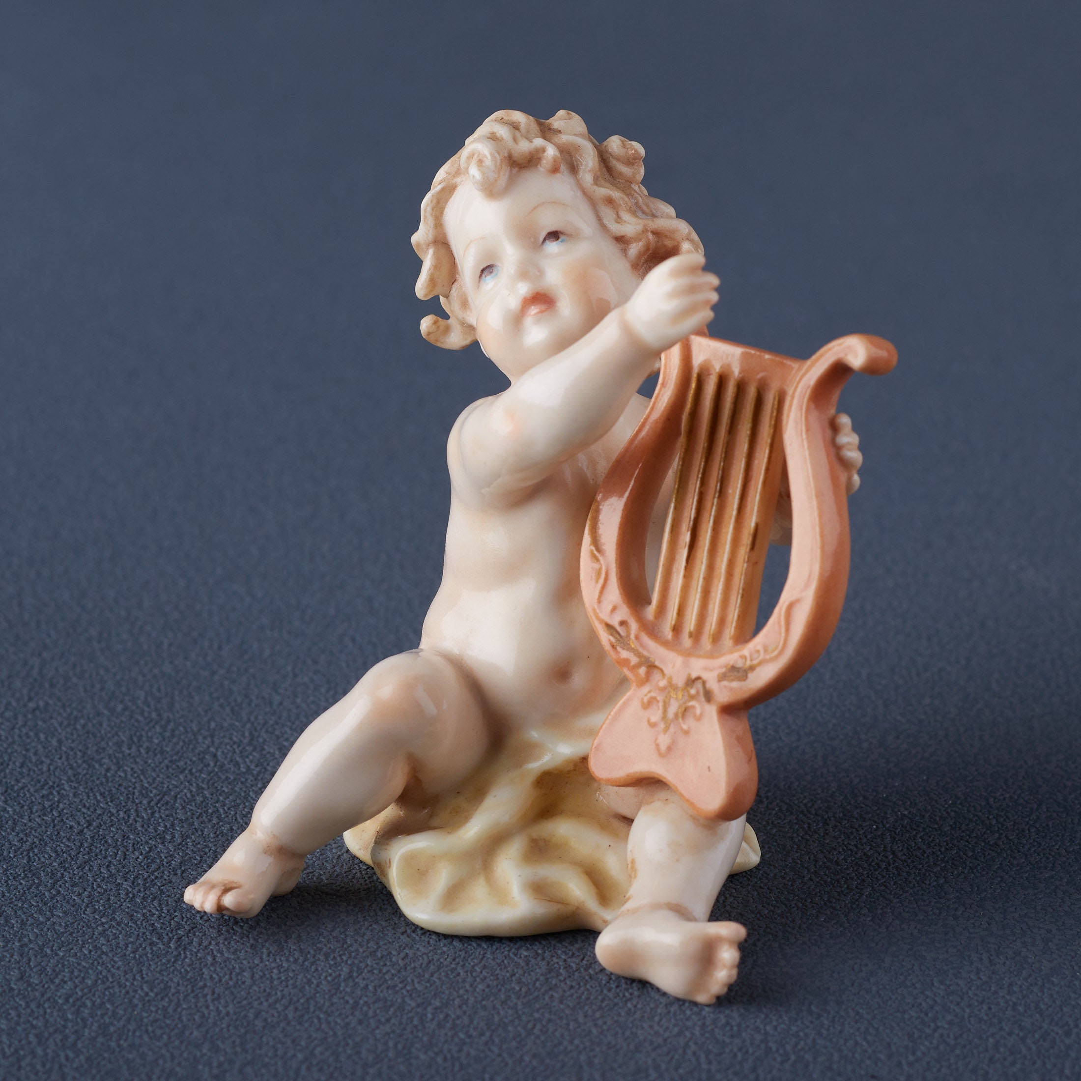Infant Playing Lute