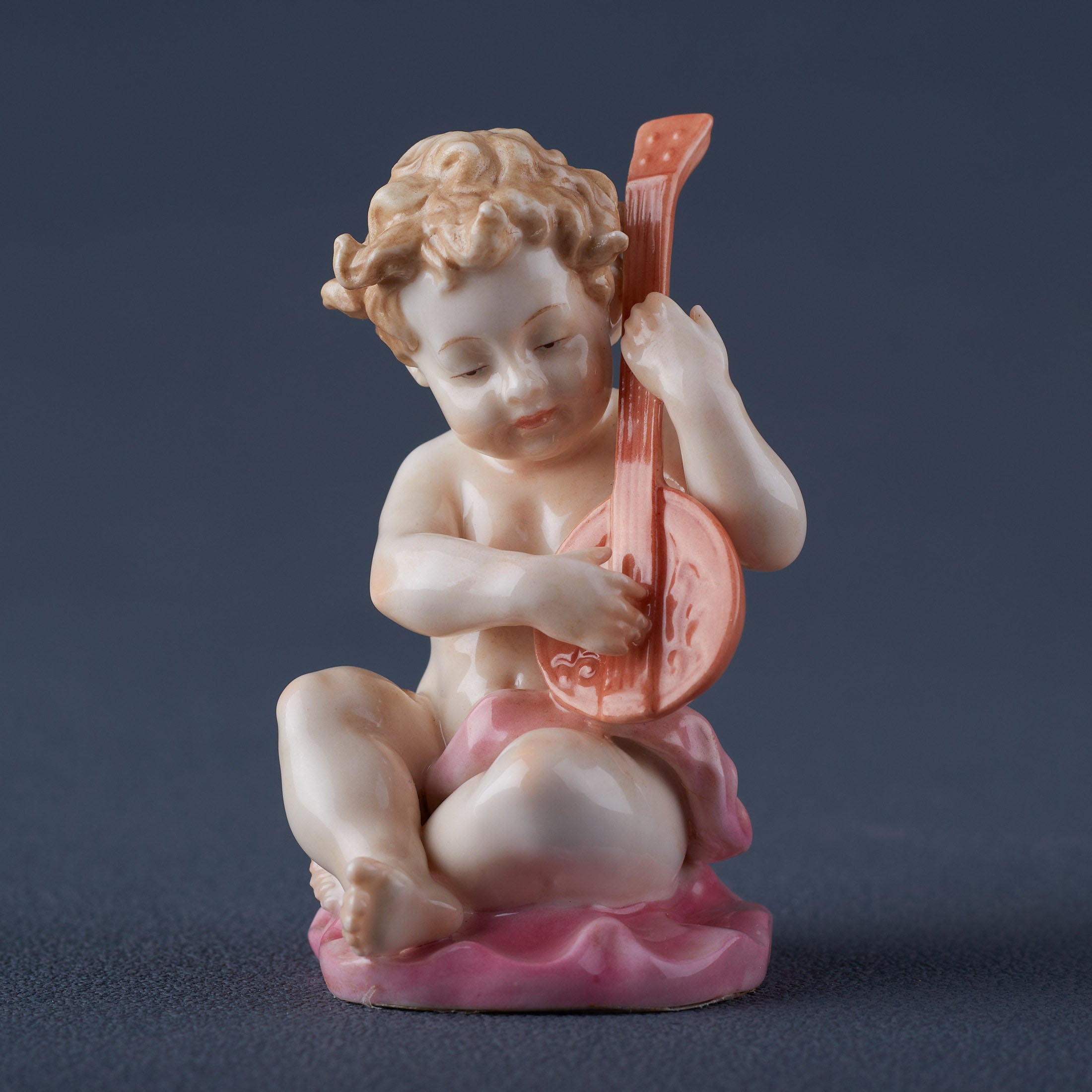 Infant Playing Lyre