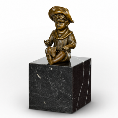 Bronze Sculpture of a Little Boy Sitting | Figurines & Statues