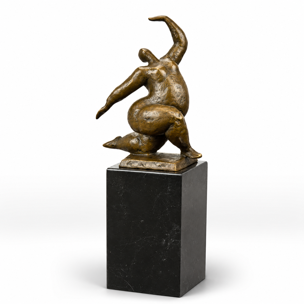 Abstract handcrafted bronze sculpture of a balancing female figure mounted on a black marble pedestal.