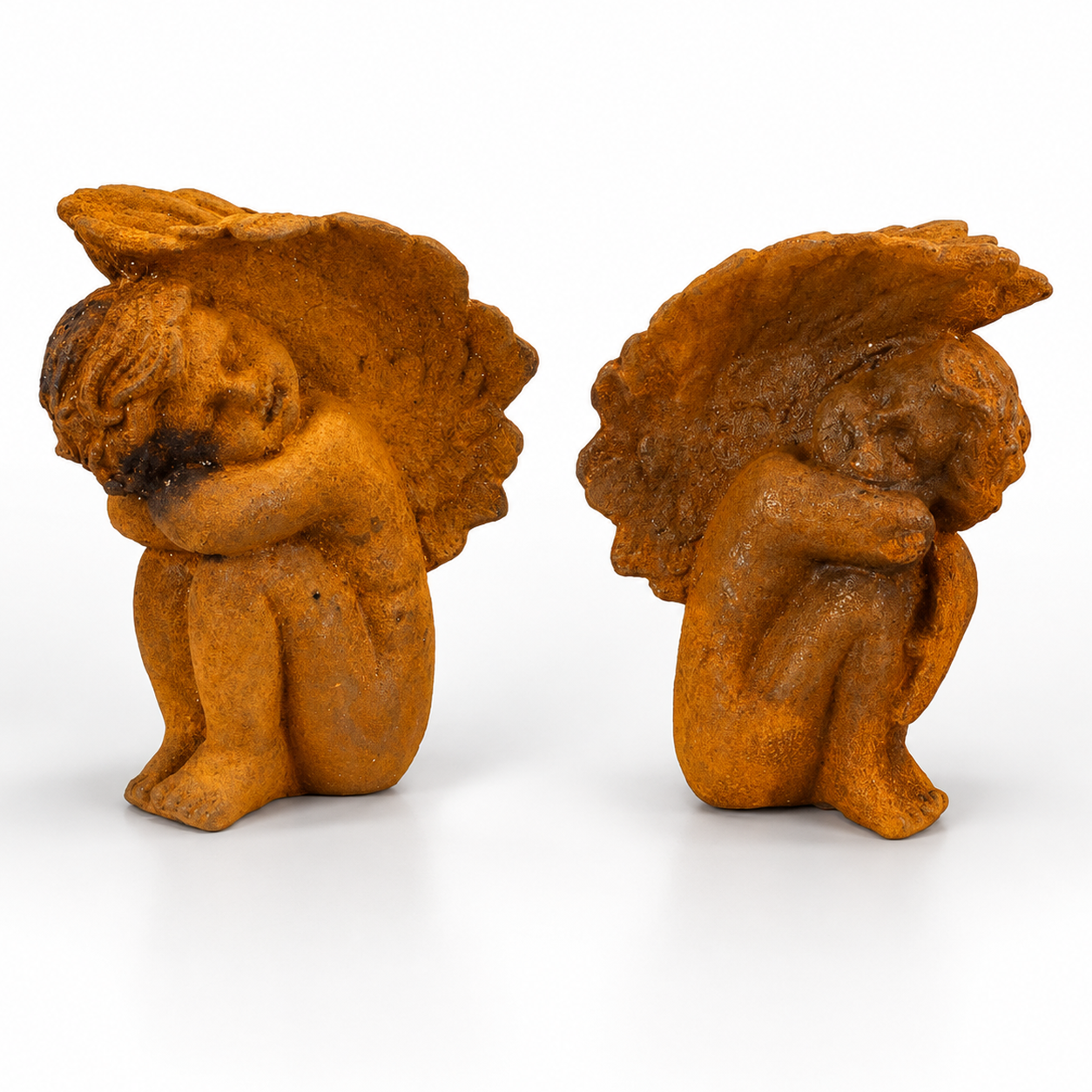 Pair of Rusty Cast Iron Putti Book-ends | Curios & Collectibles