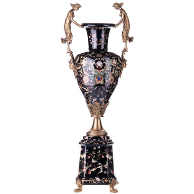 This grand decorative urn features a finely painted floral porcelain