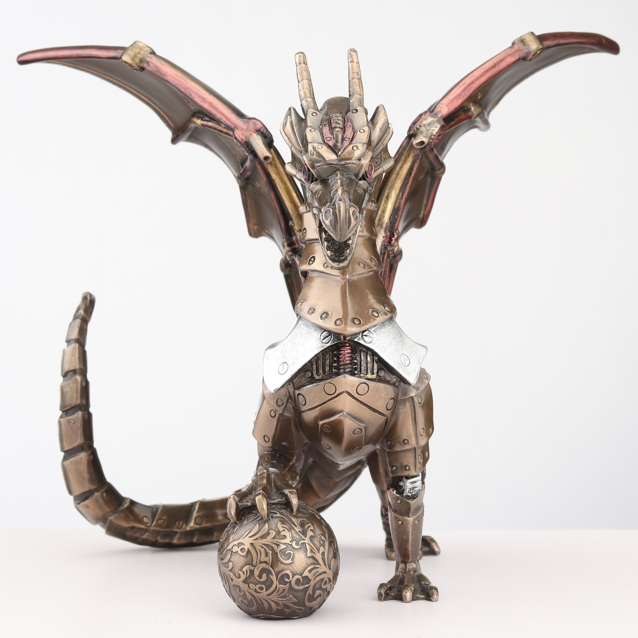 Steampunk Dragon Sitting And Holding Sphere