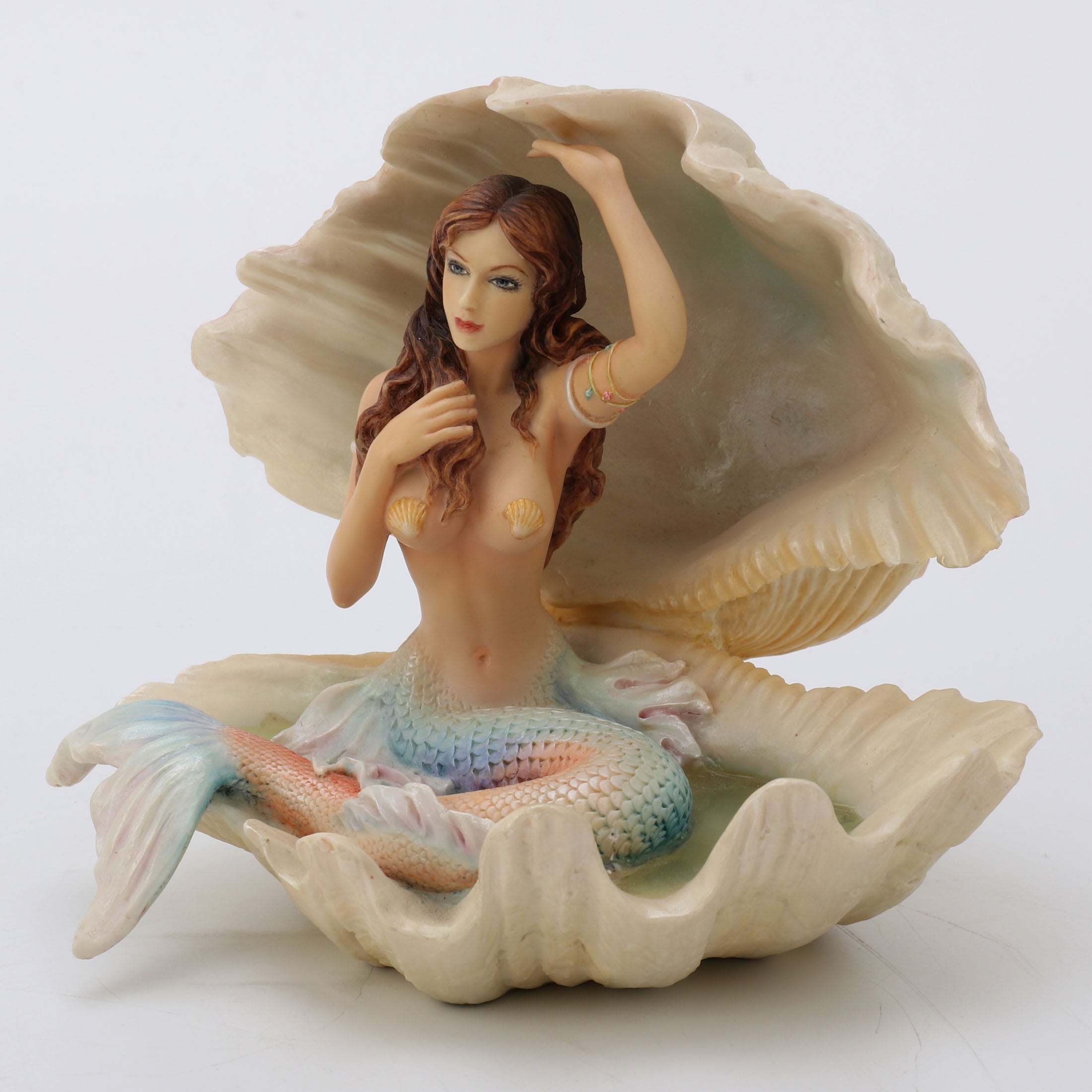 Mermaid Sitting In Seashell