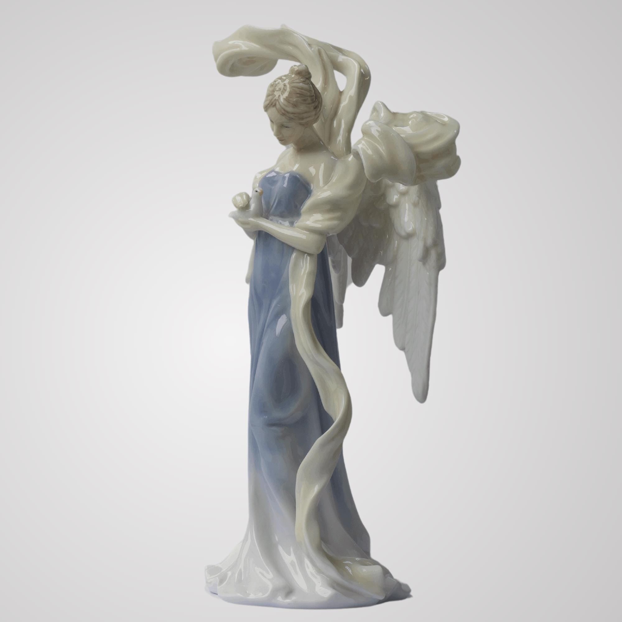 9.75 Inch Glazed Porcelain Open Winged Angel Figurine Holding Dove