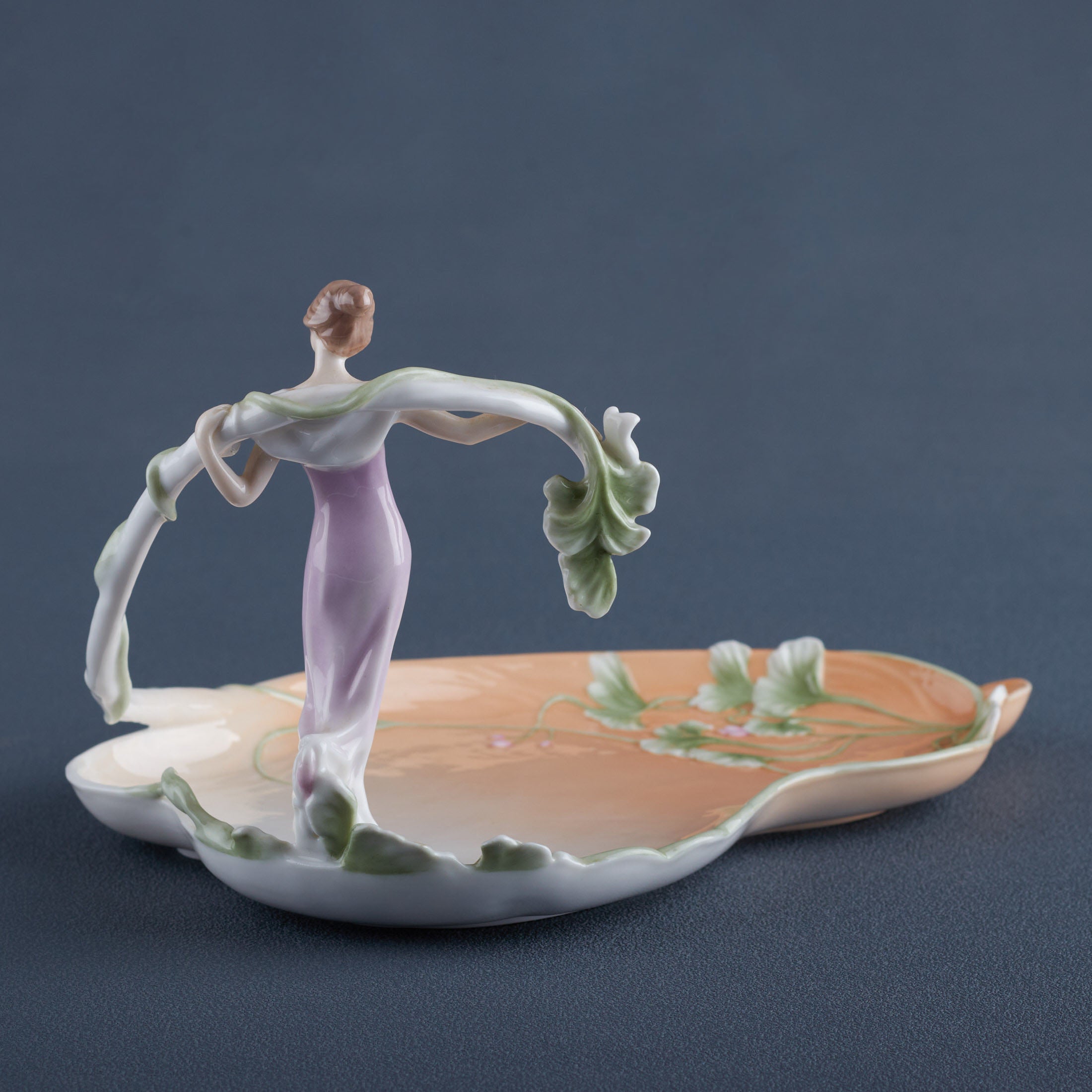 Standing Woman With Vine Tray