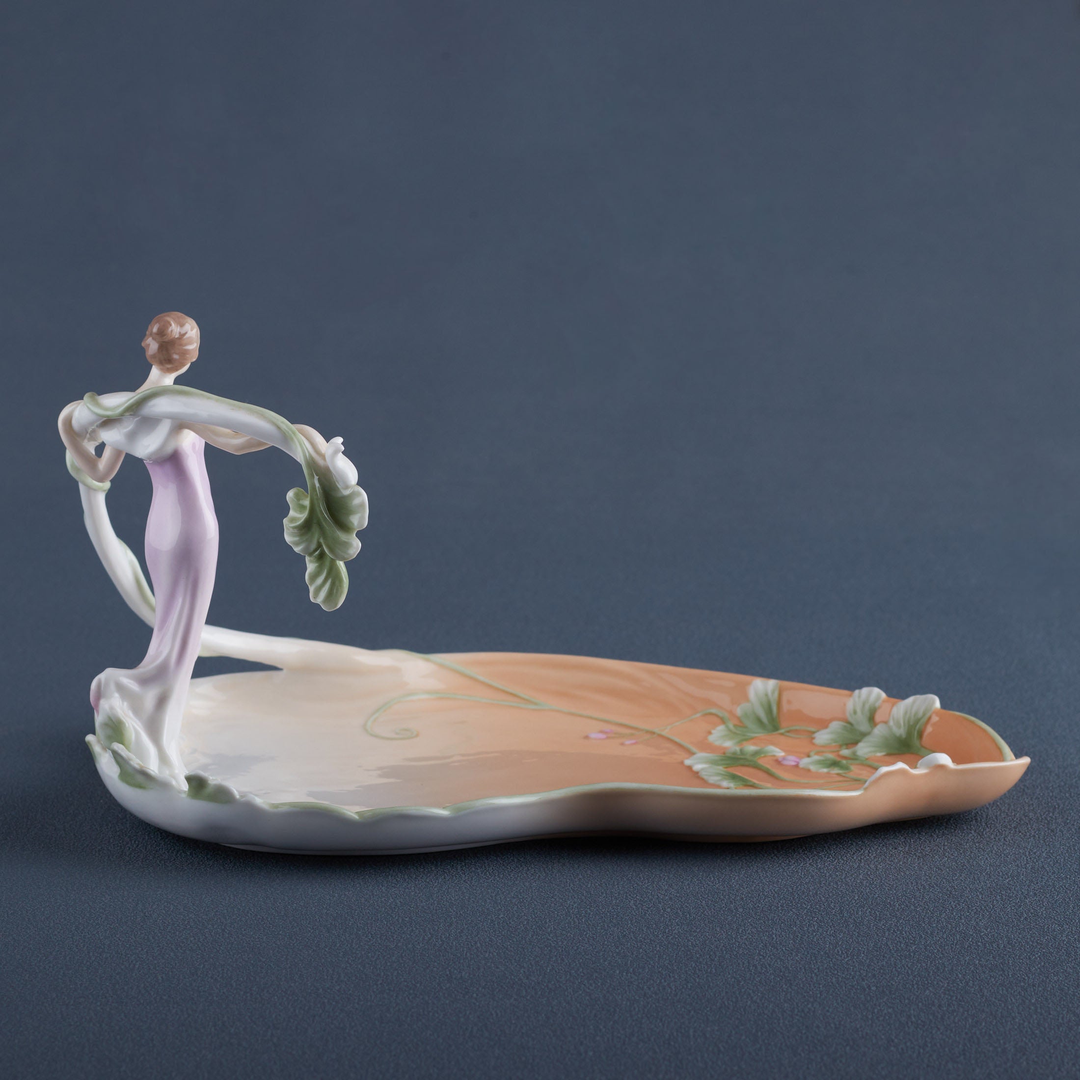 Standing Woman With Vine Tray