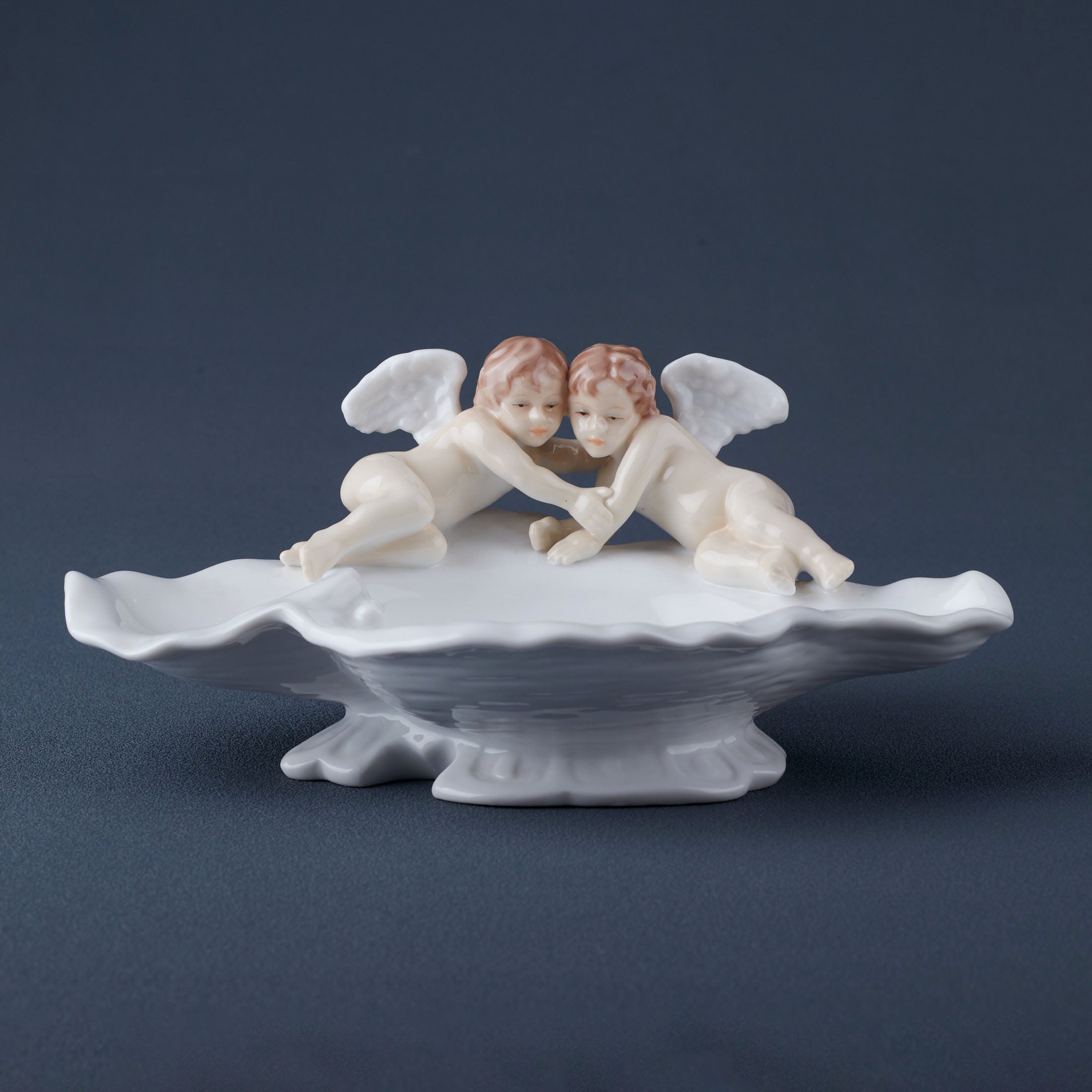 Cherubs On Wavy Shell Raised Dish
