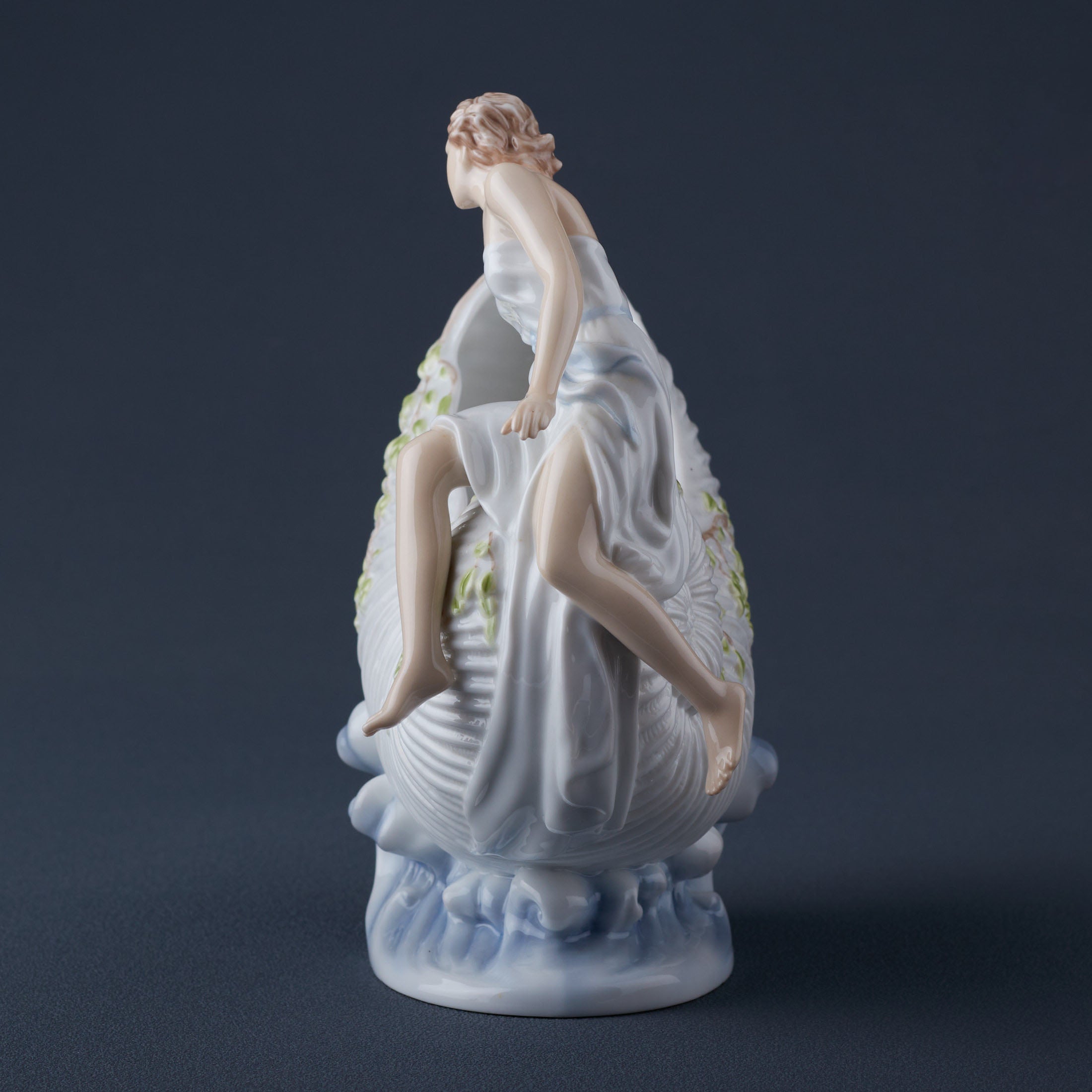 Woman On Argonaut Shell Sauce Train