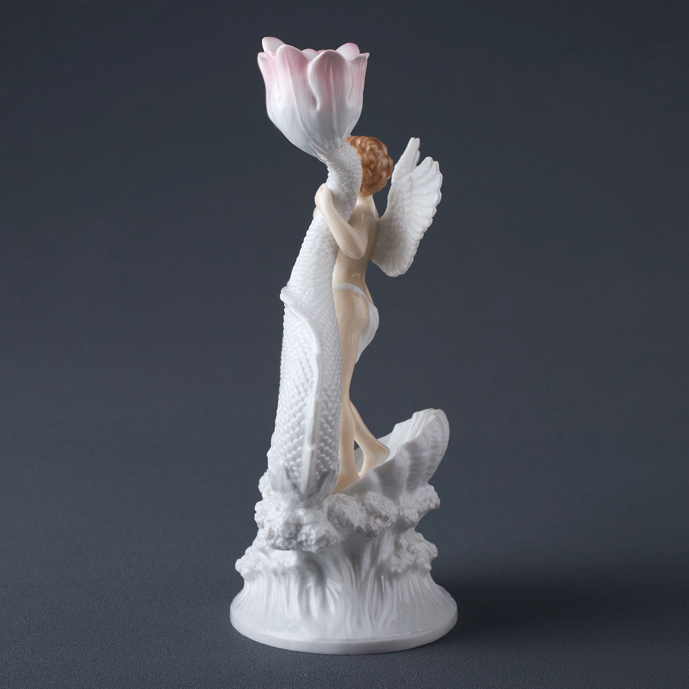Cherub Holding Twin Fish