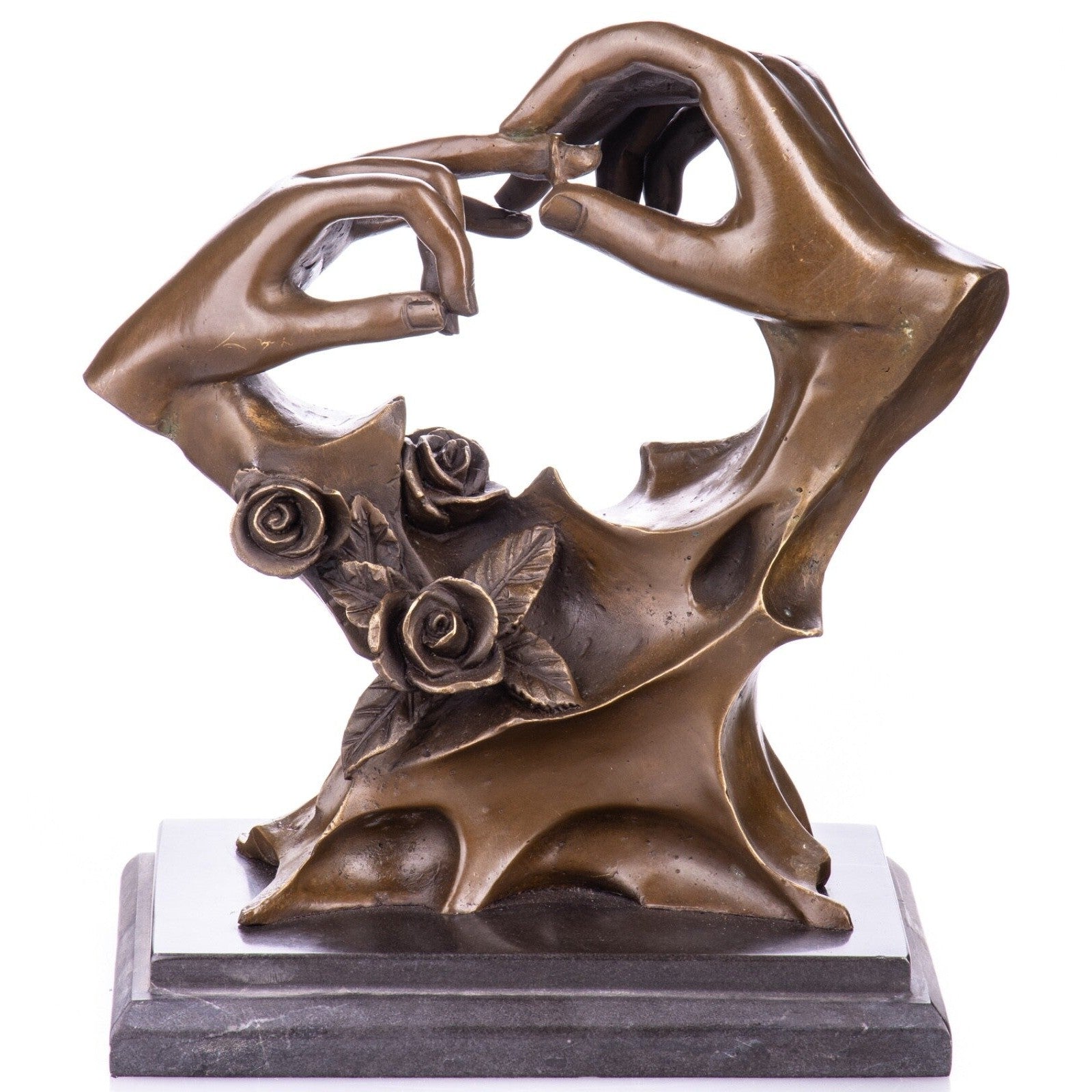 Abstract bronze sculpture of two intertwined hands with roses on a marble base against a white background.