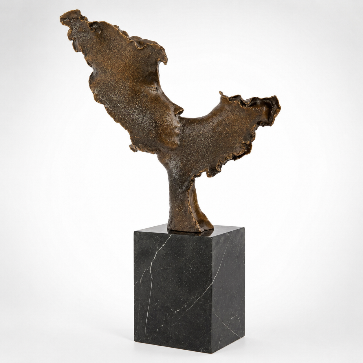 Bronze Sculpture of Two Faces Kissing | Figurines & Statues