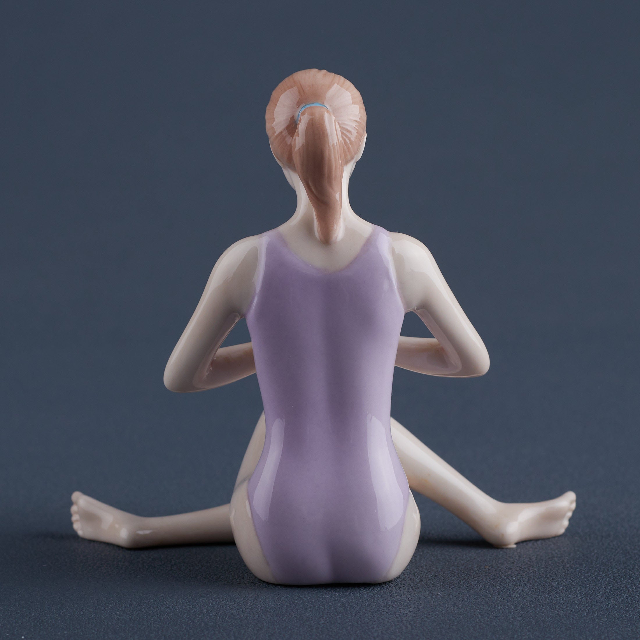 Cow Pose (Gomukhasana)