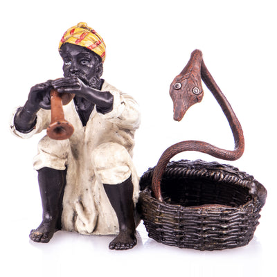 Colored bronze figure of Viennese style Arabian snake charmer