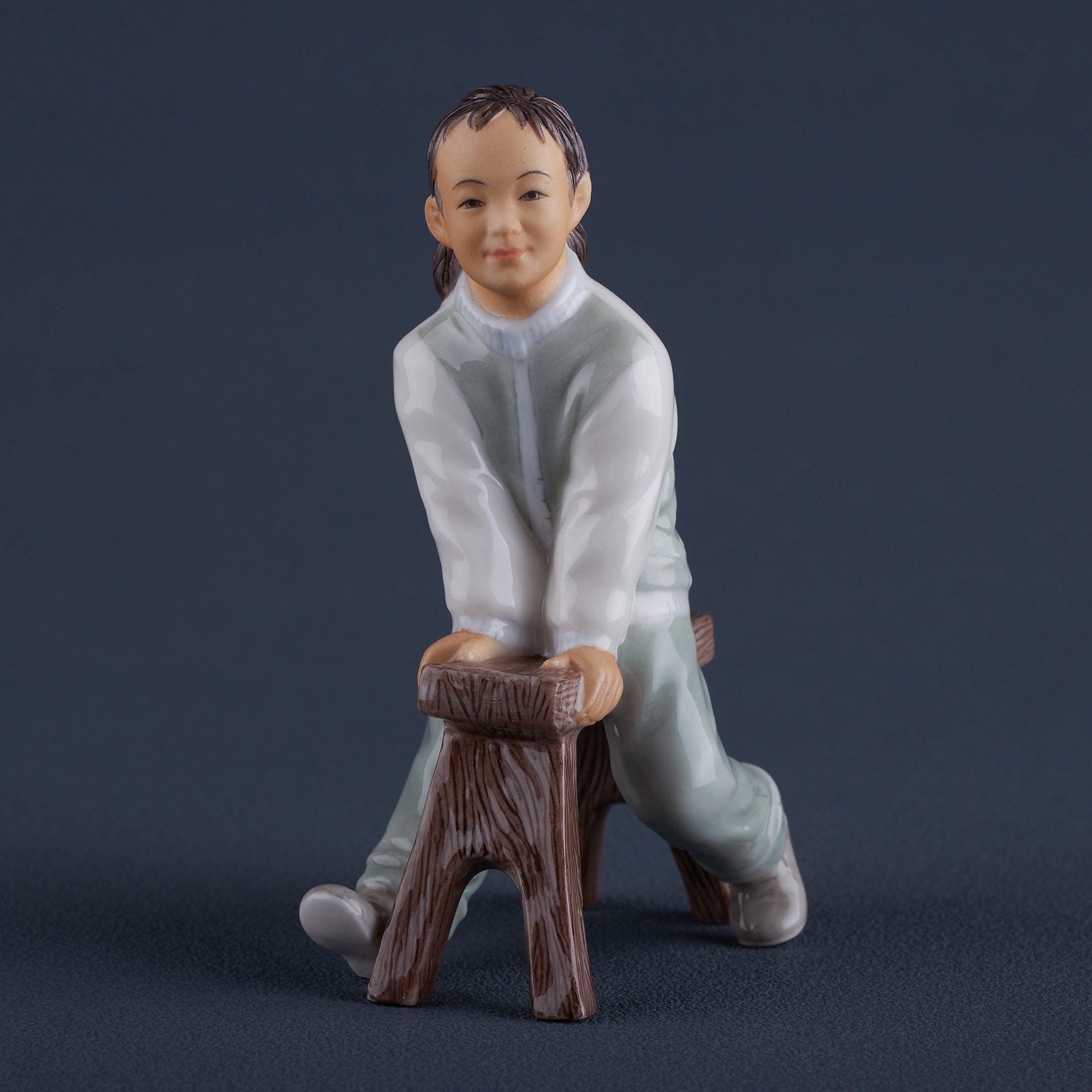 Oriental YouthGirl On Long Stool