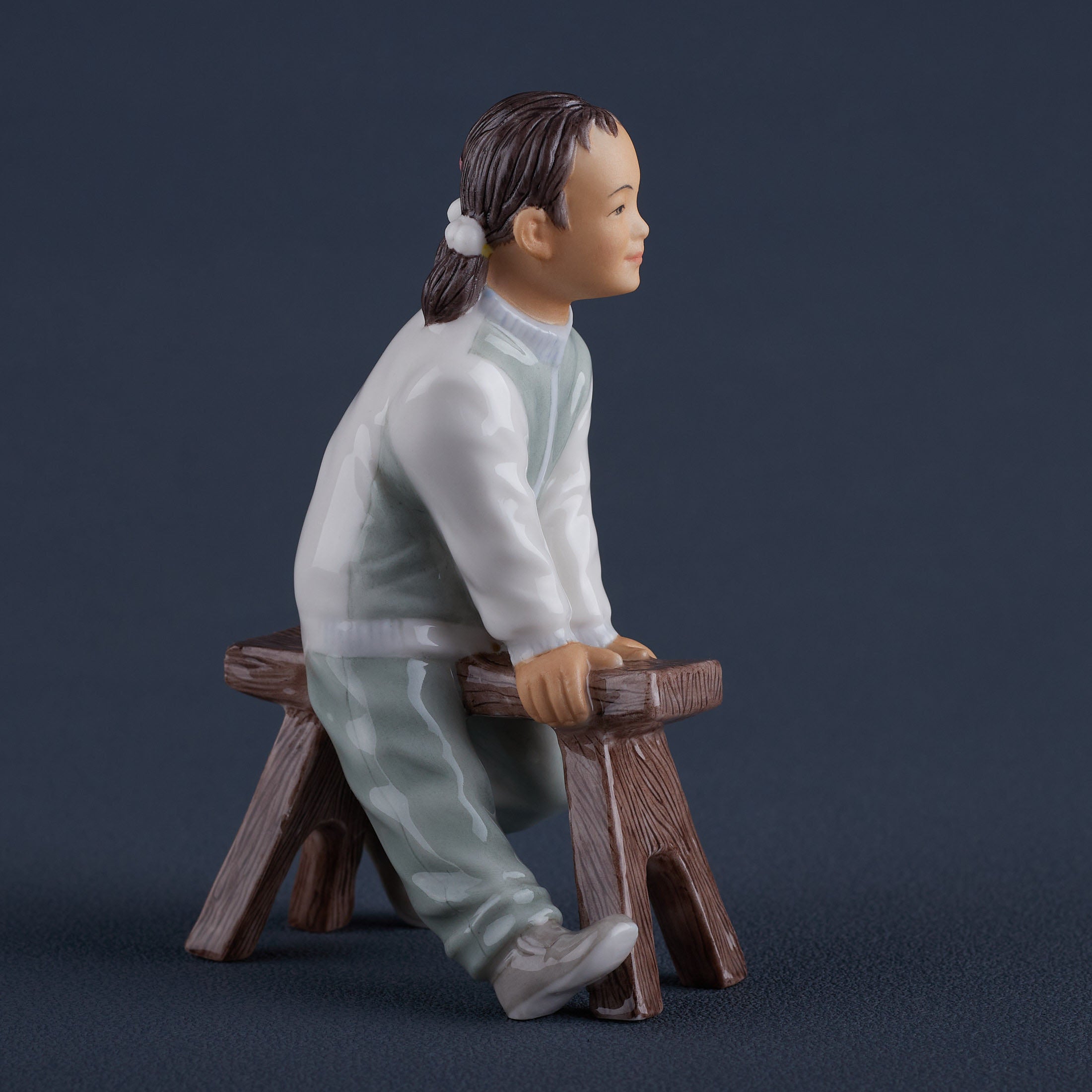 Oriental YouthGirl On Long Stool