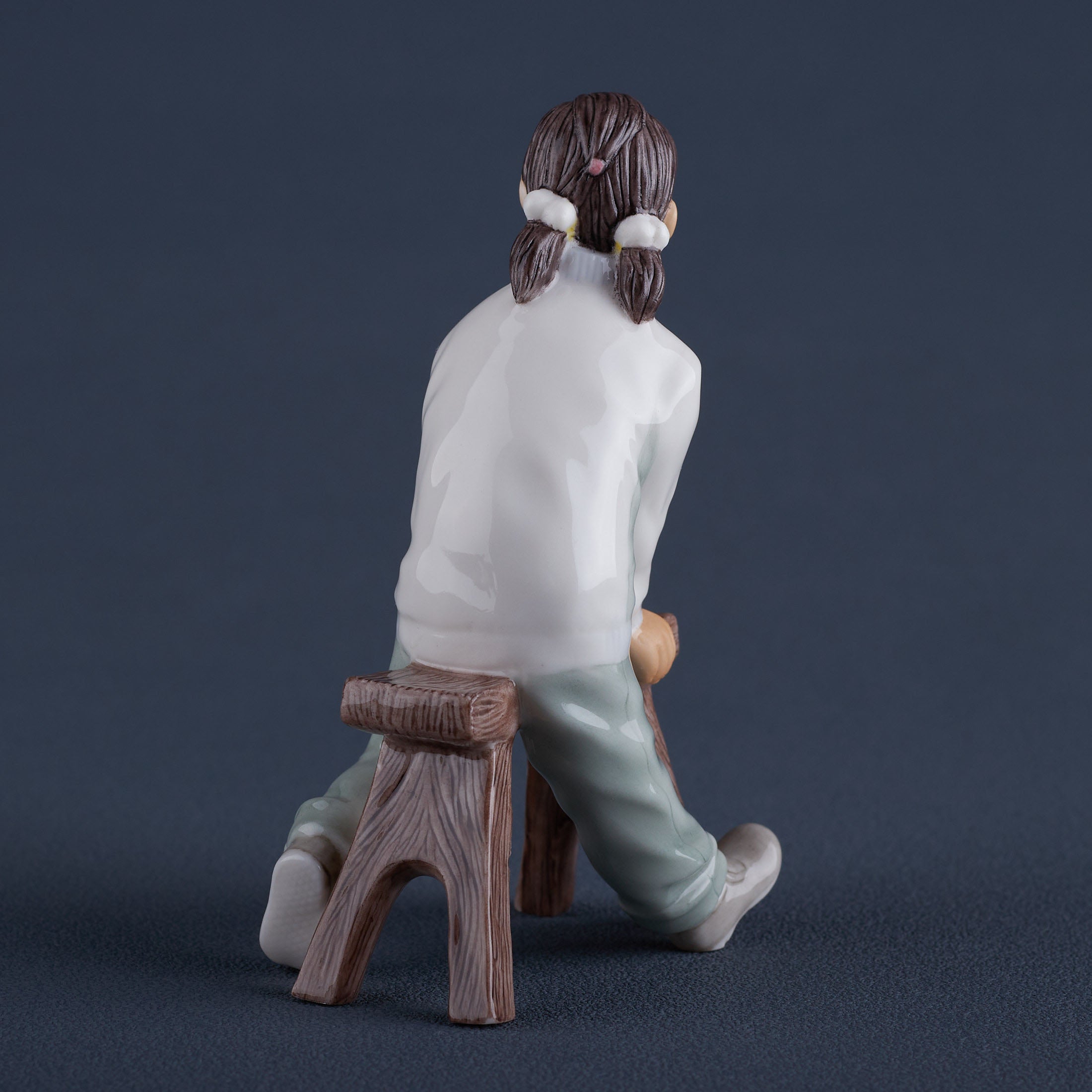 Oriental YouthGirl On Long Stool