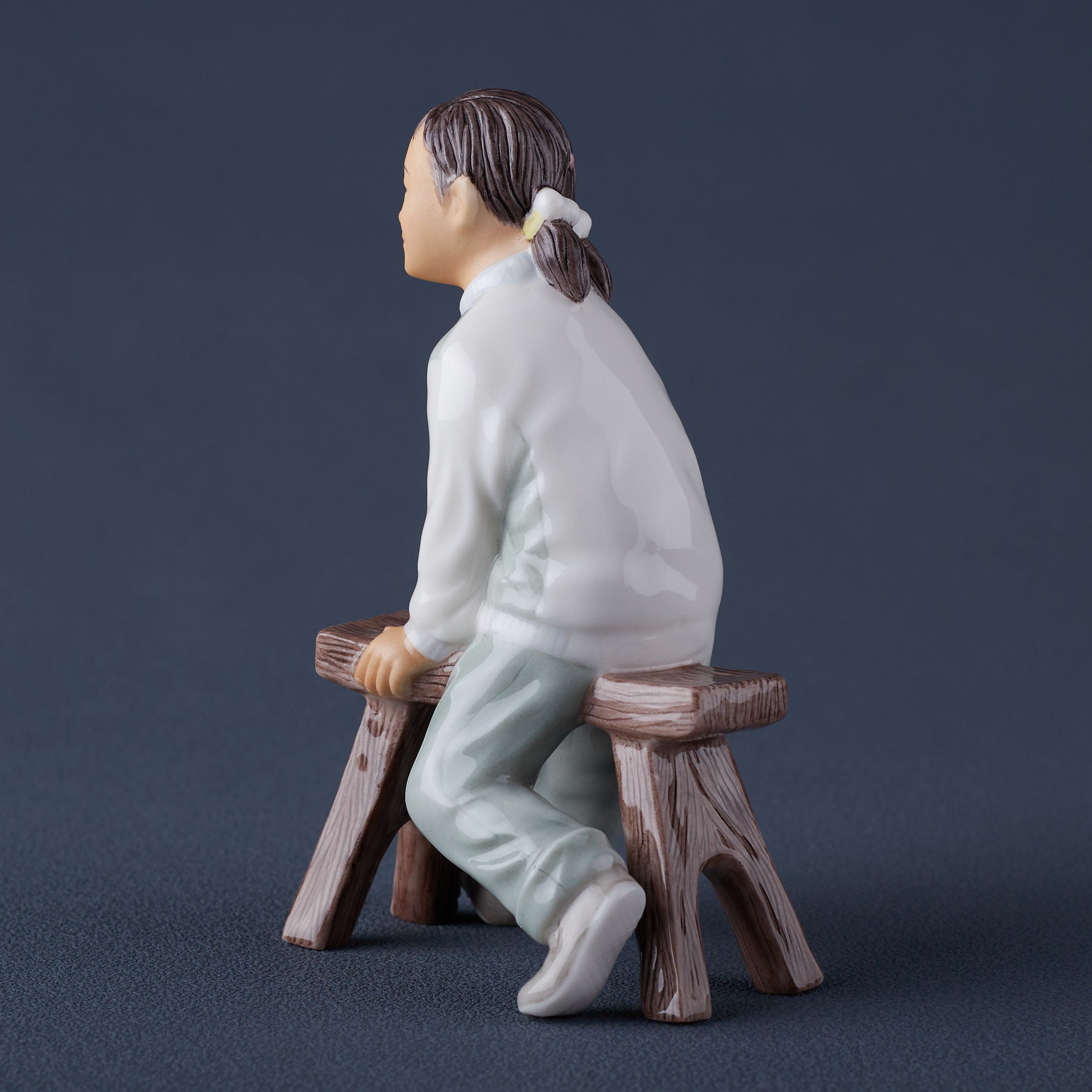 Oriental YouthGirl On Long Stool