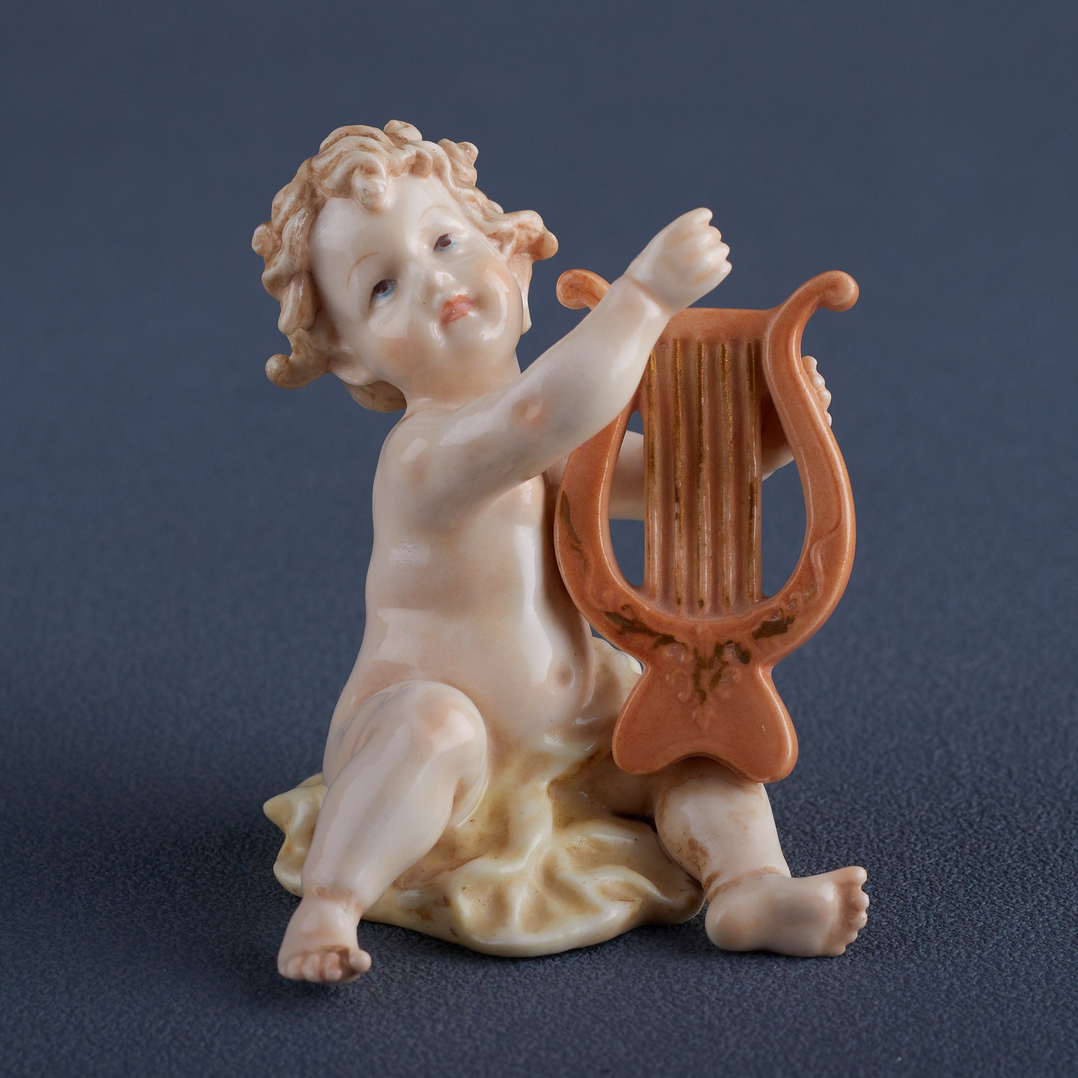 Infant Playing Lute