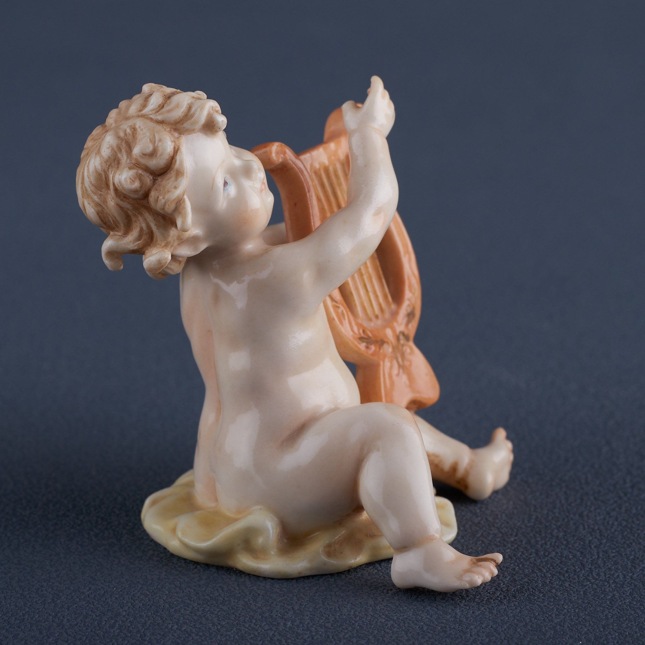 Infant Playing Lute