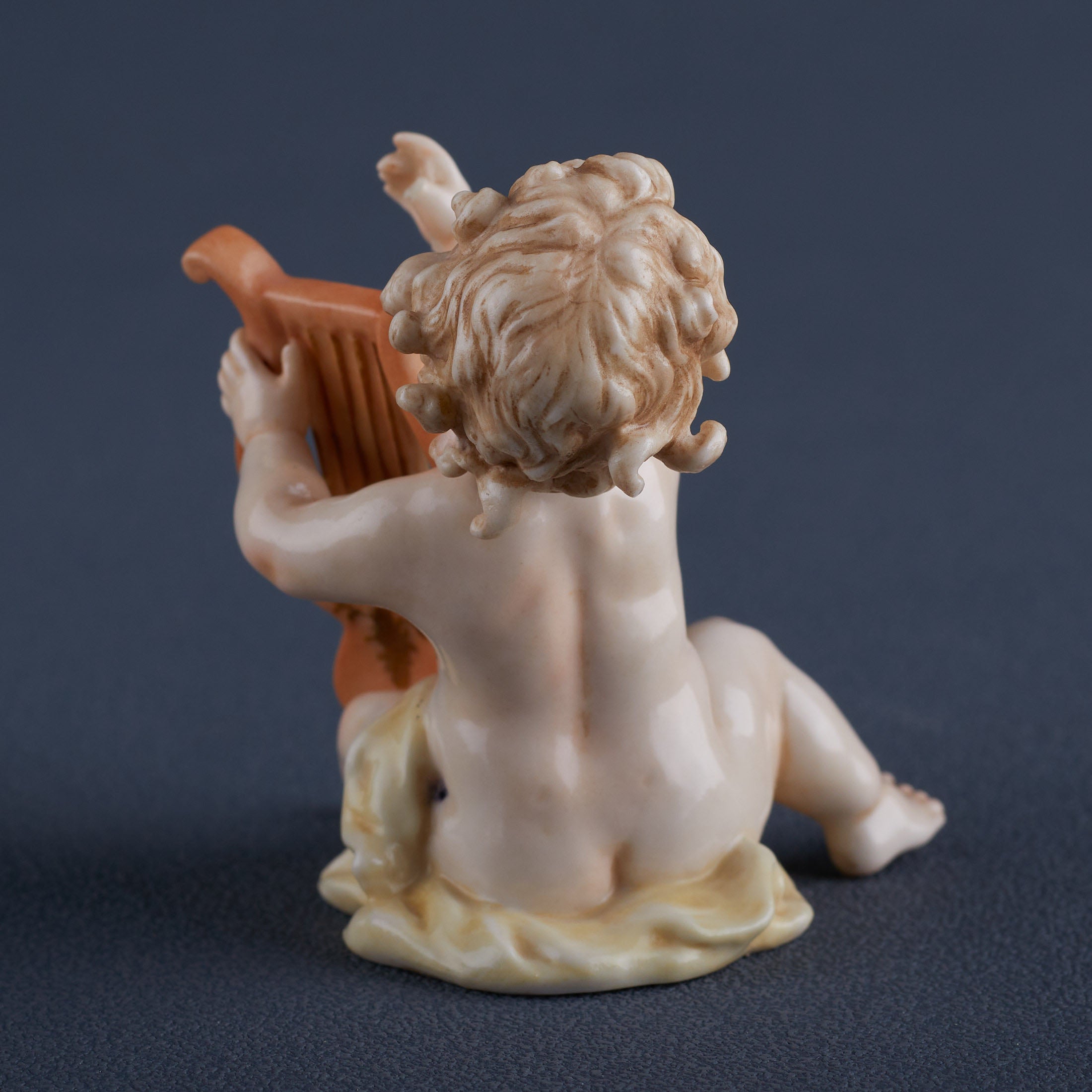 Infant Playing Lute