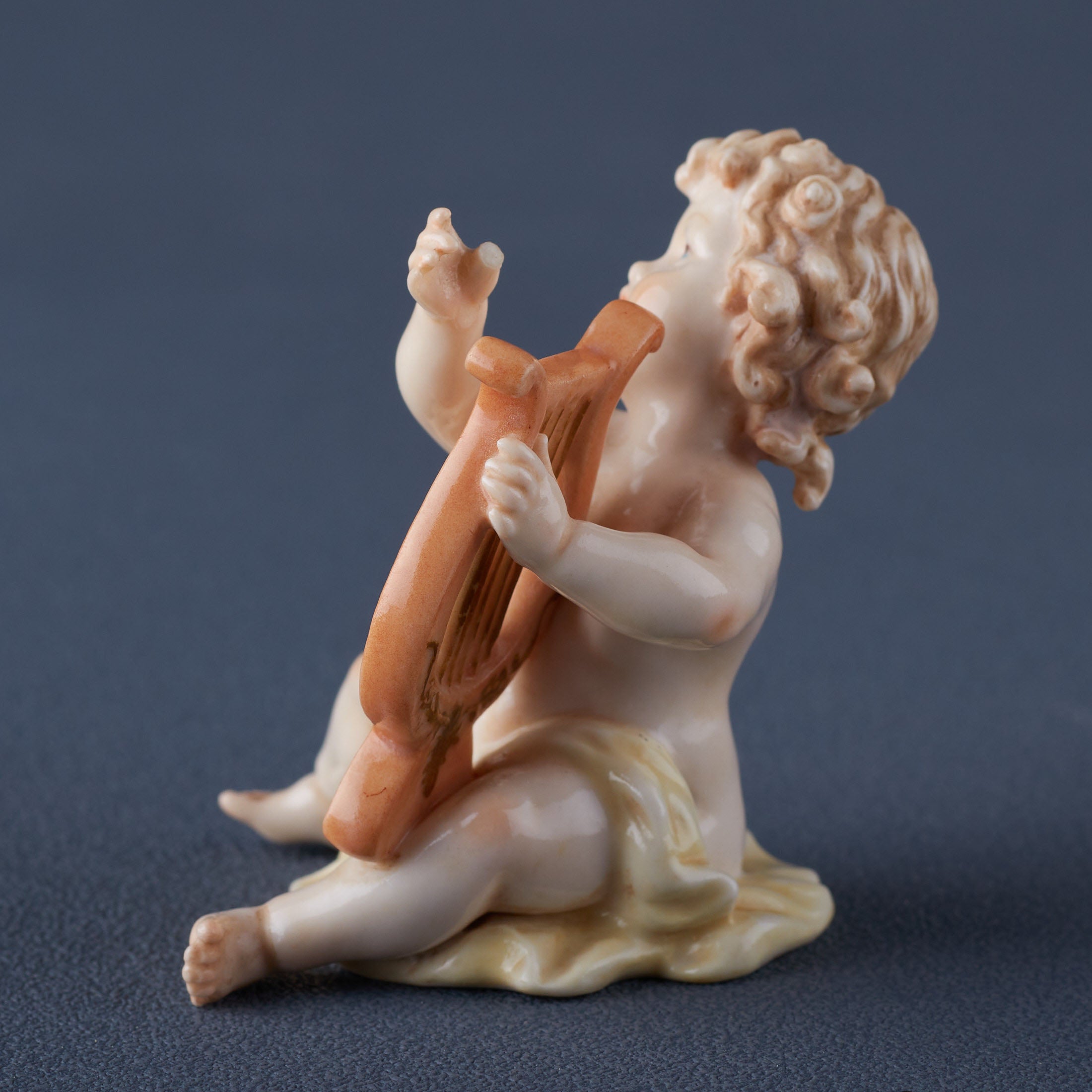 Infant Playing Lute