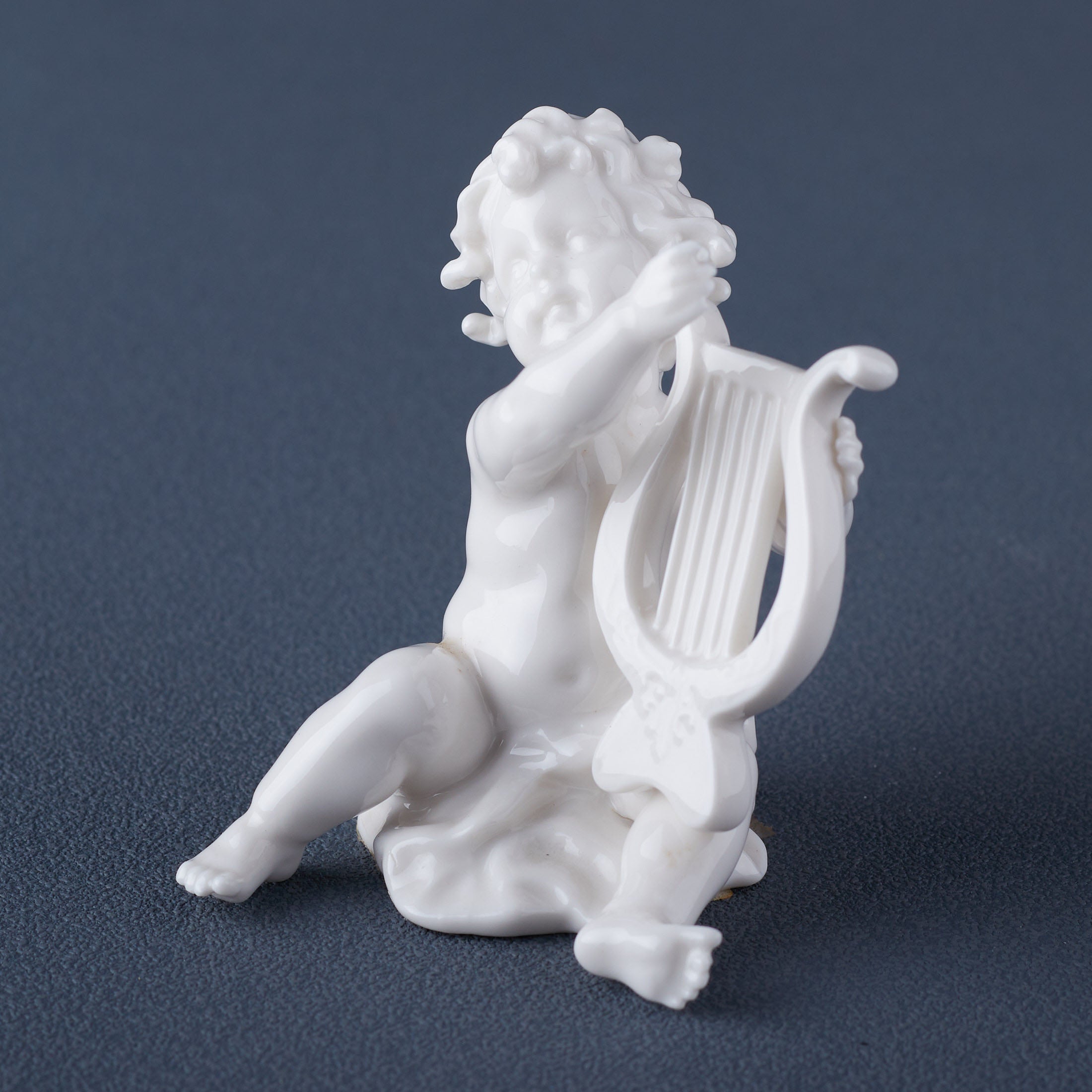 Infant Playing Lute(White)