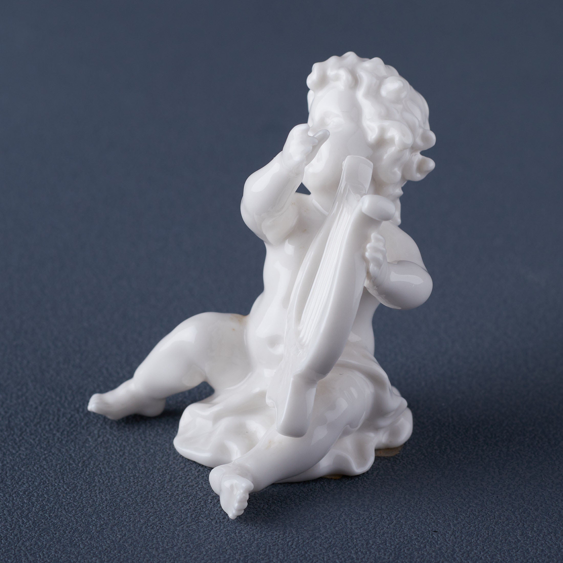 Infant Playing Lute(White)