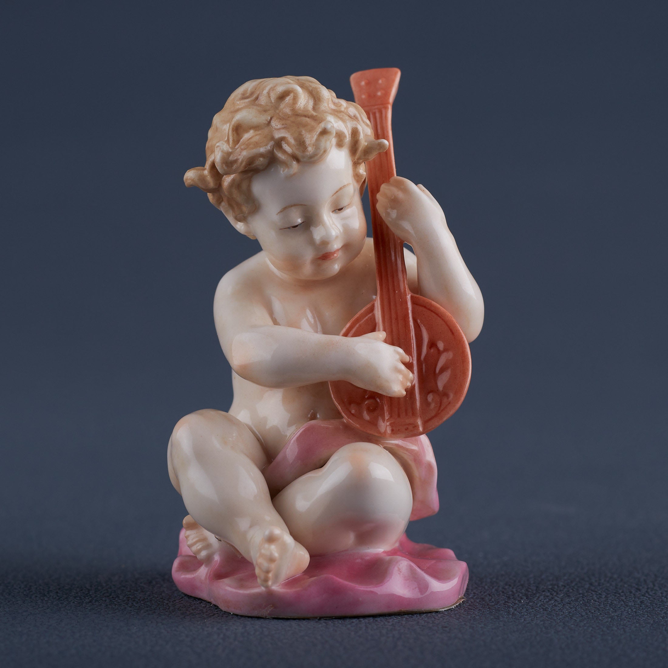 Infant Playing Lyre
