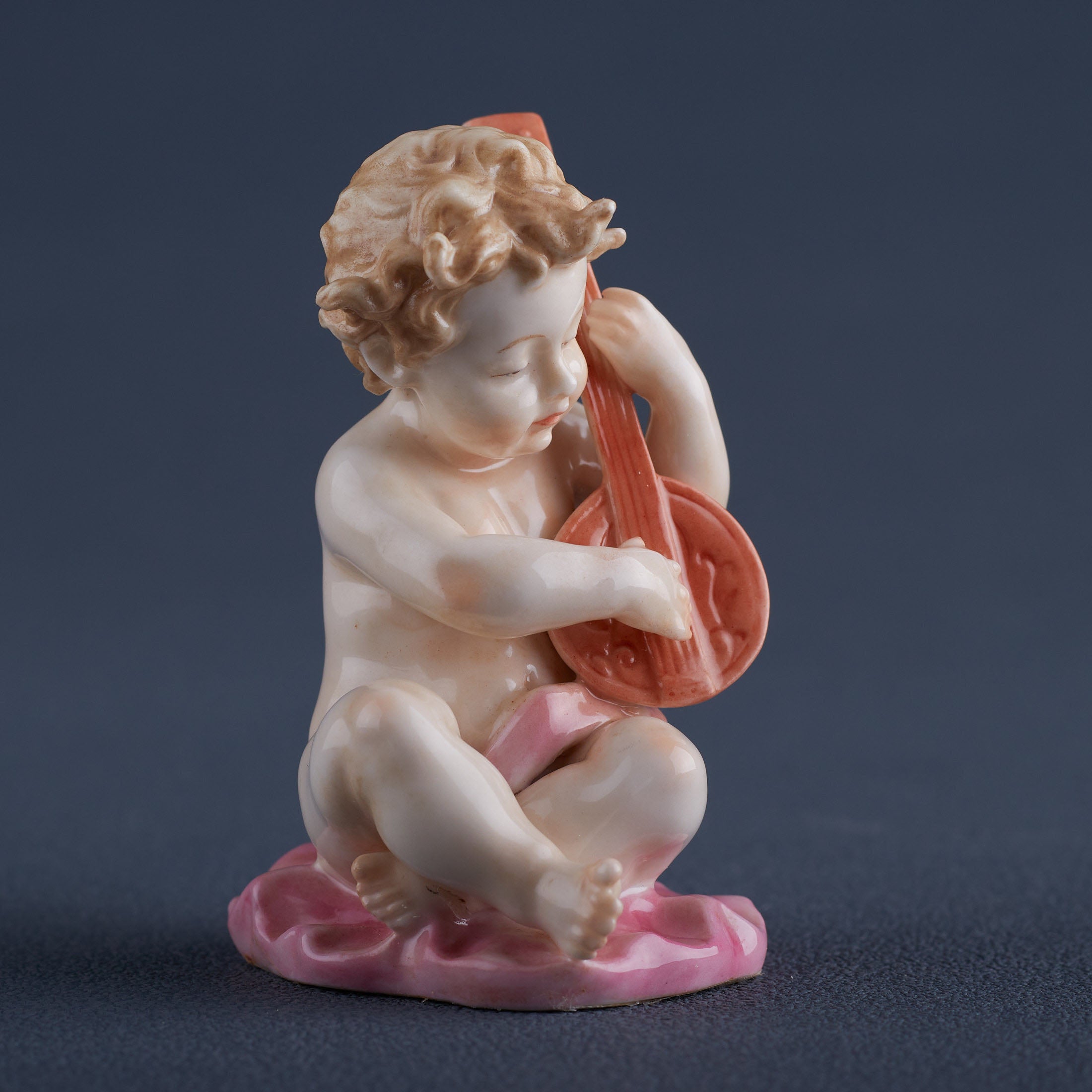 Infant Playing Lyre