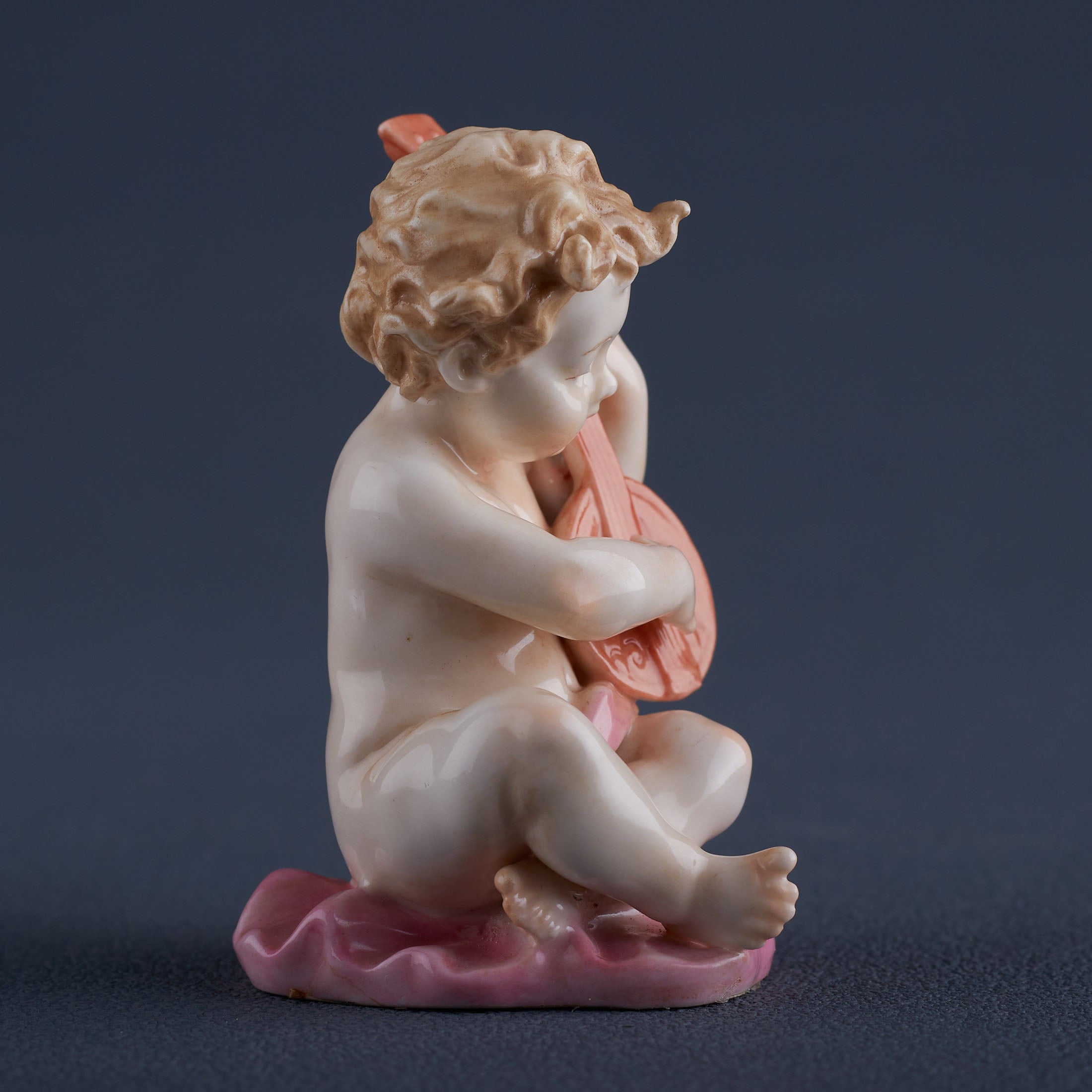 Infant Playing Lyre