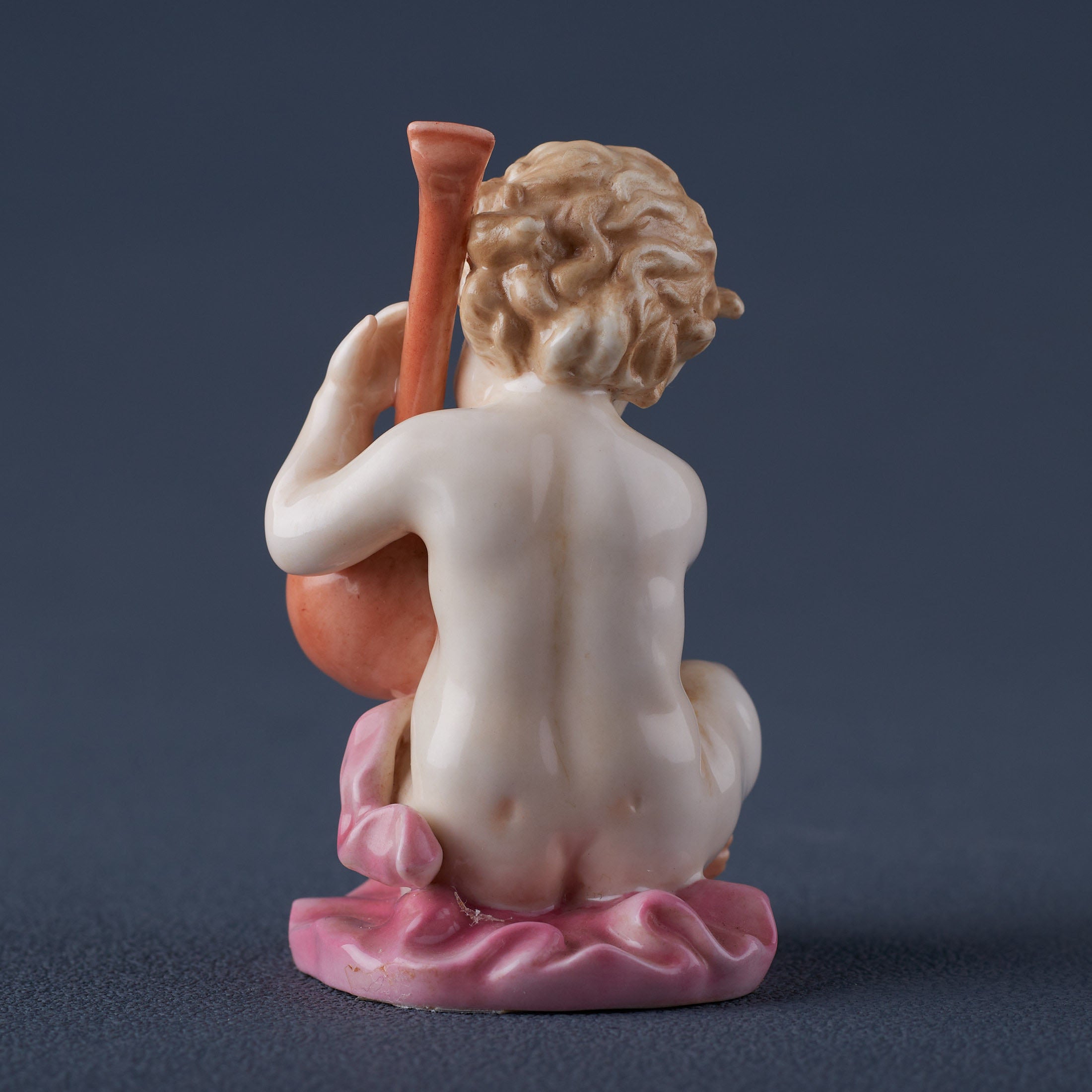 Infant Playing Lyre