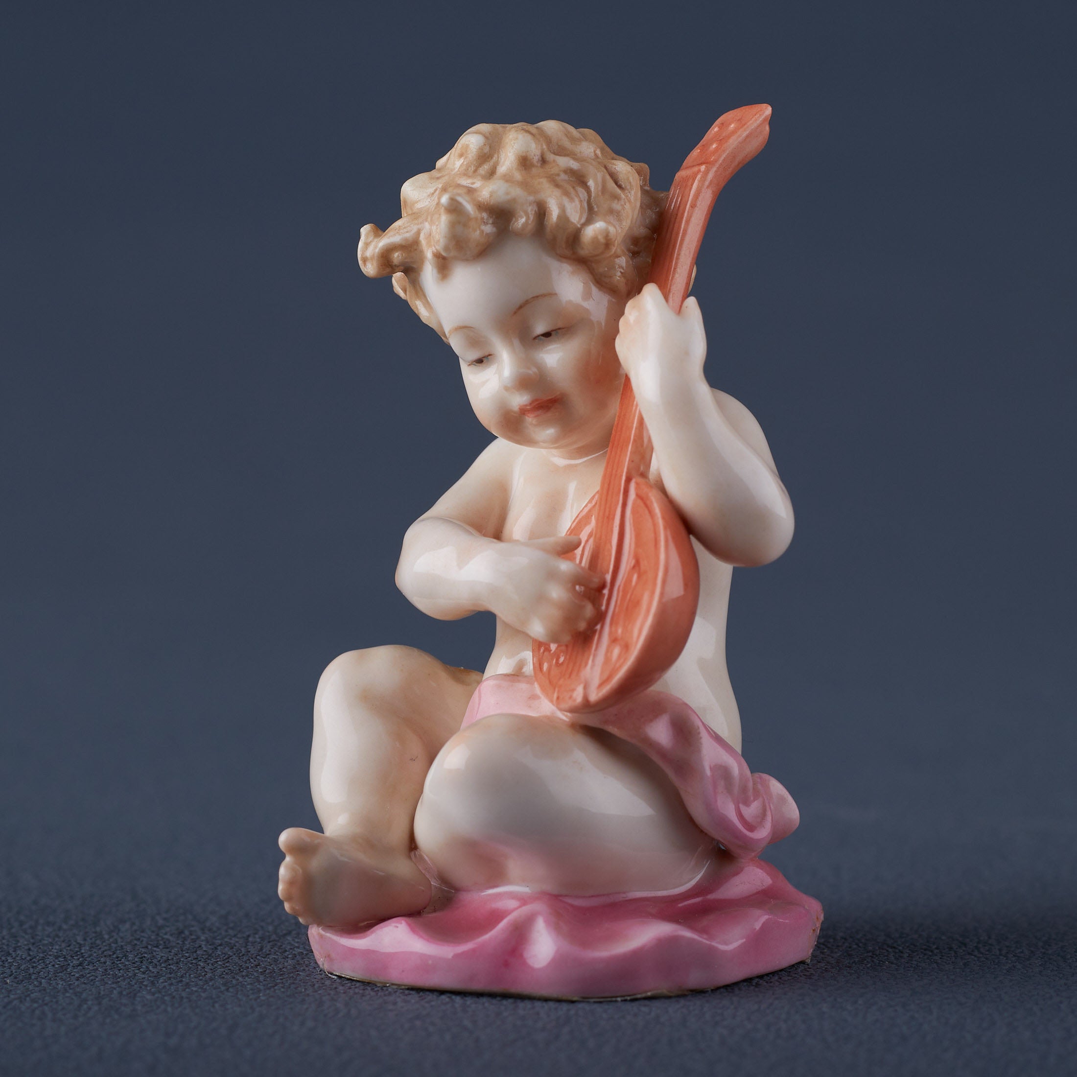Infant Playing Lyre