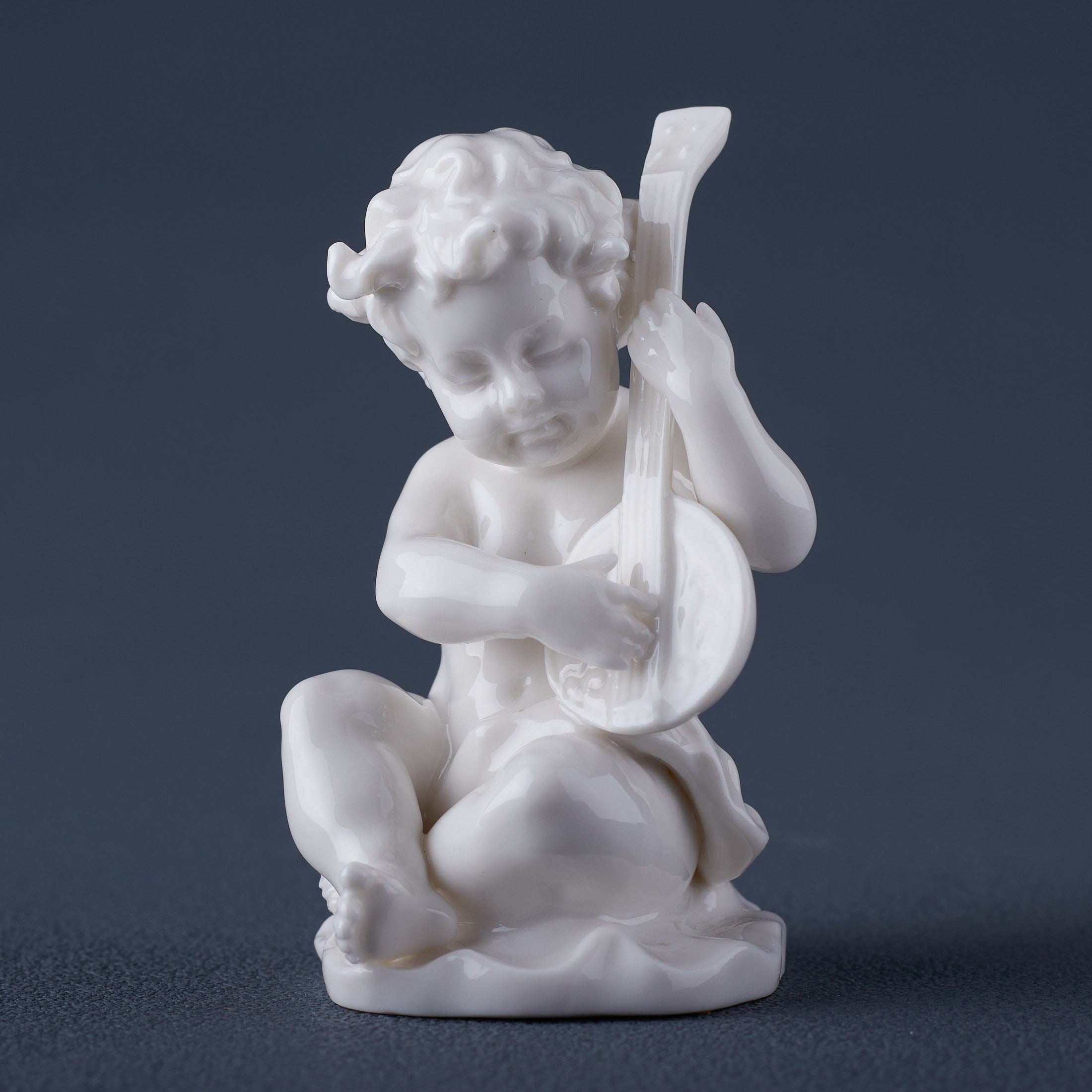 Infant Playing Lyre(White)