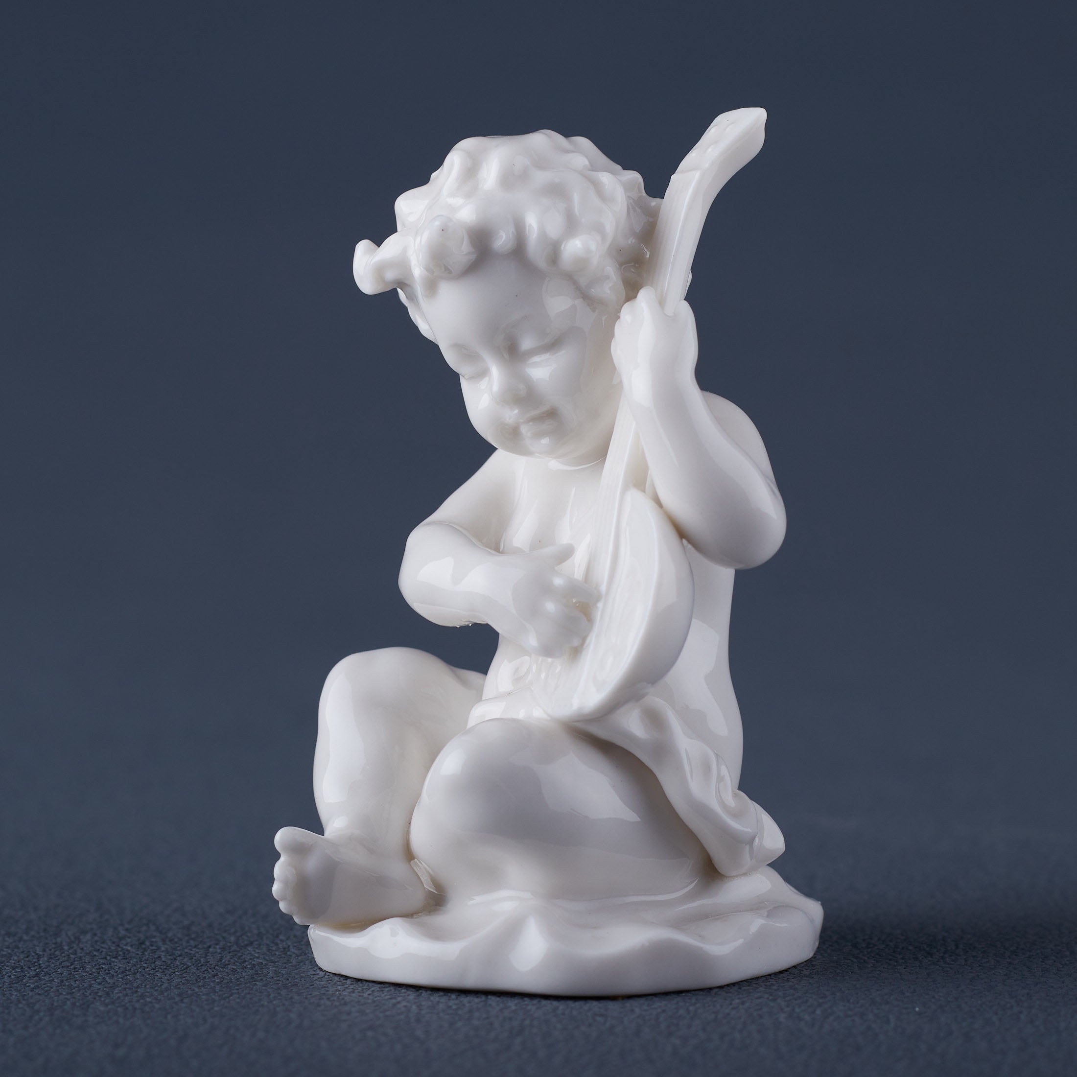 Infant Playing Lyre(White)