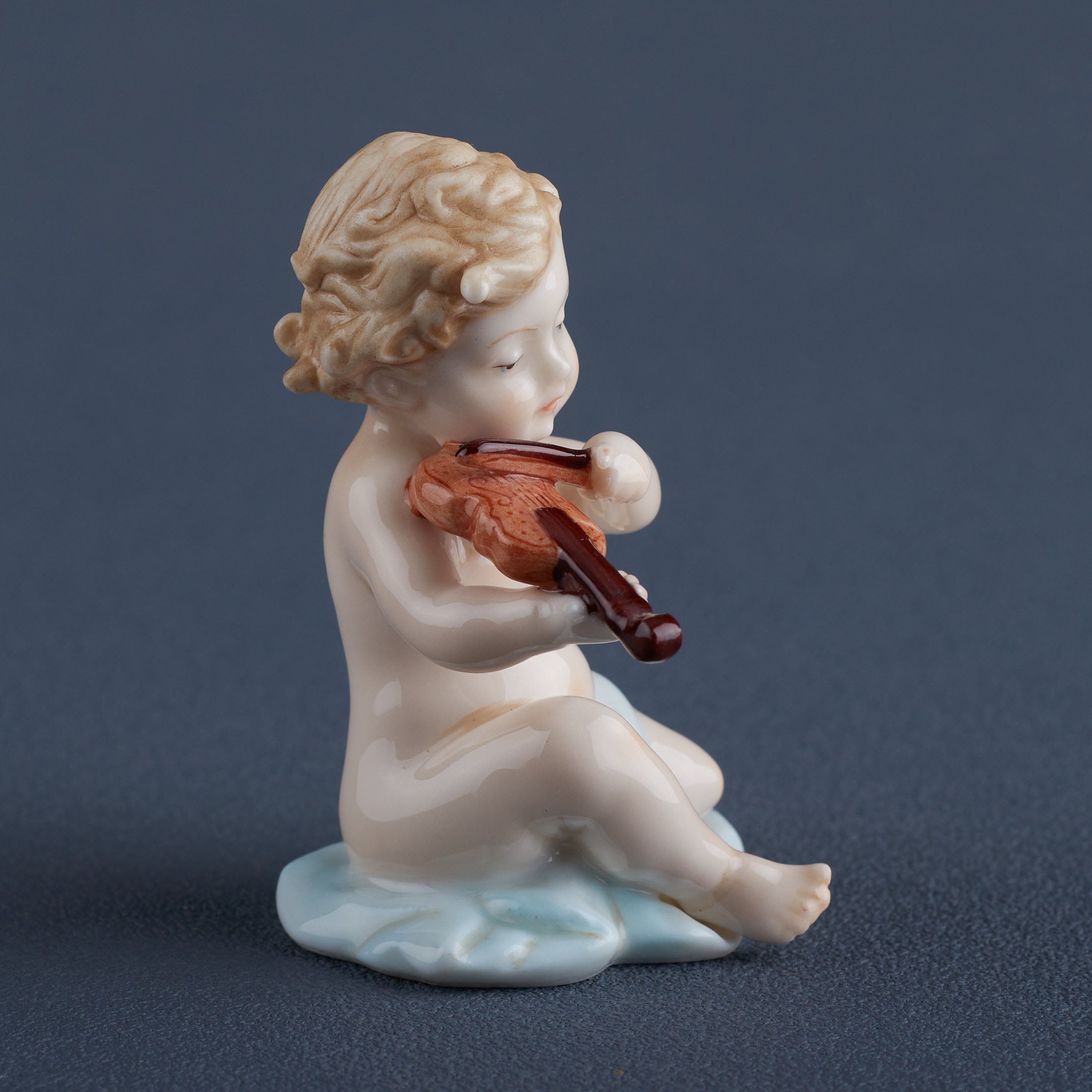 Infant Playing Violin