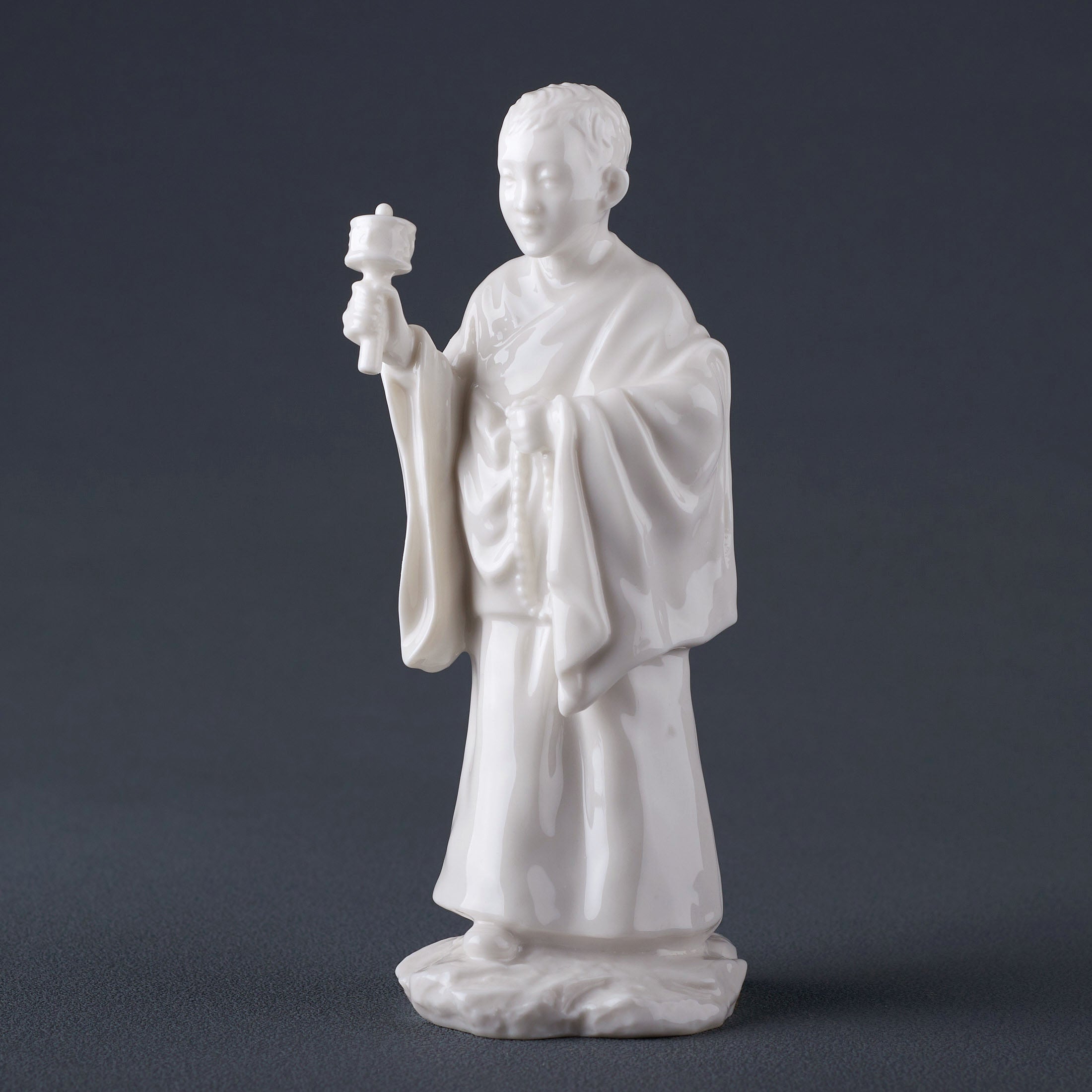 Tibet FigurineYoung Lama Holding A Zhuan Jing Lun