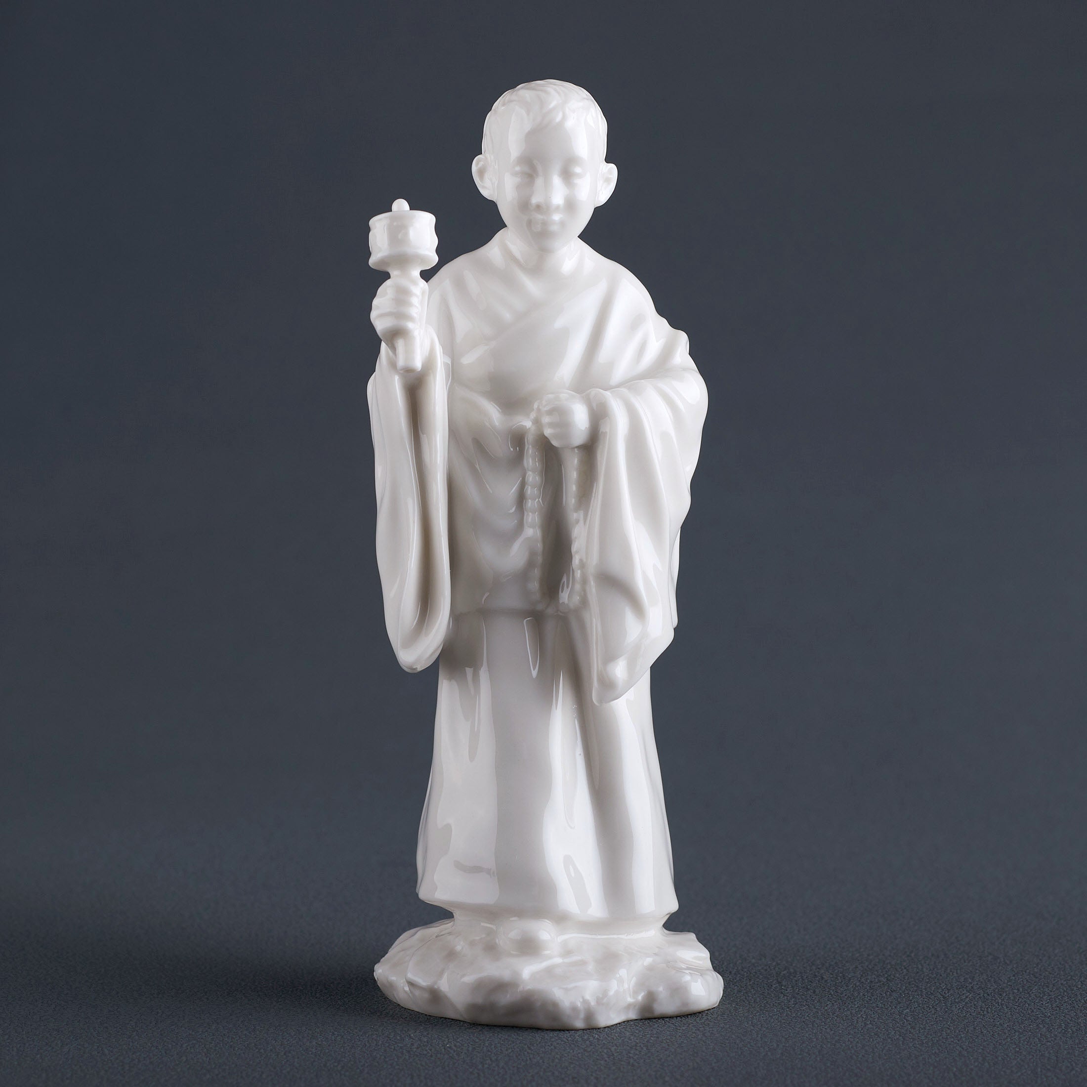 Tibet FigurineYoung Lama Holding A Zhuan Jing Lun