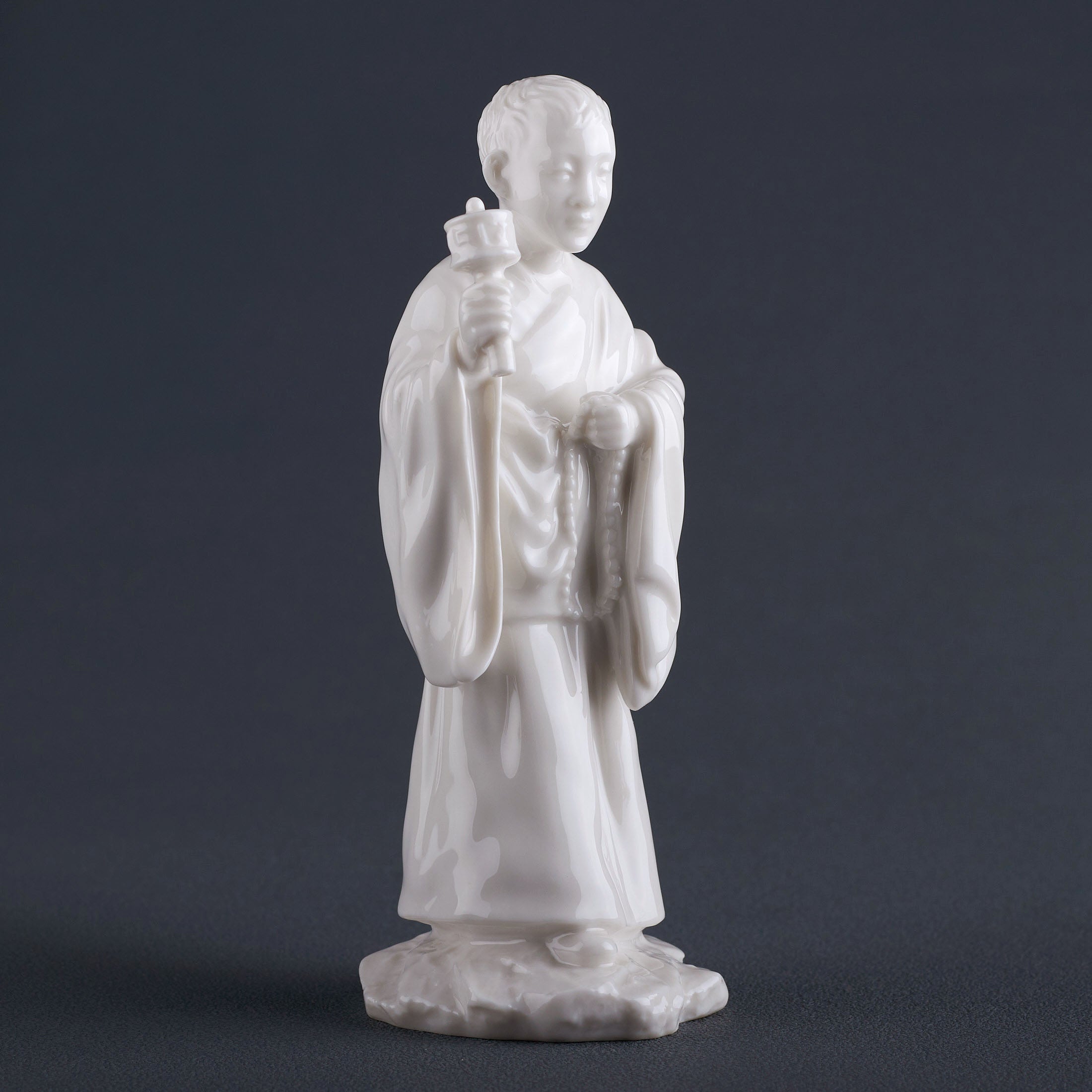 Tibet FigurineYoung Lama Holding A Zhuan Jing Lun