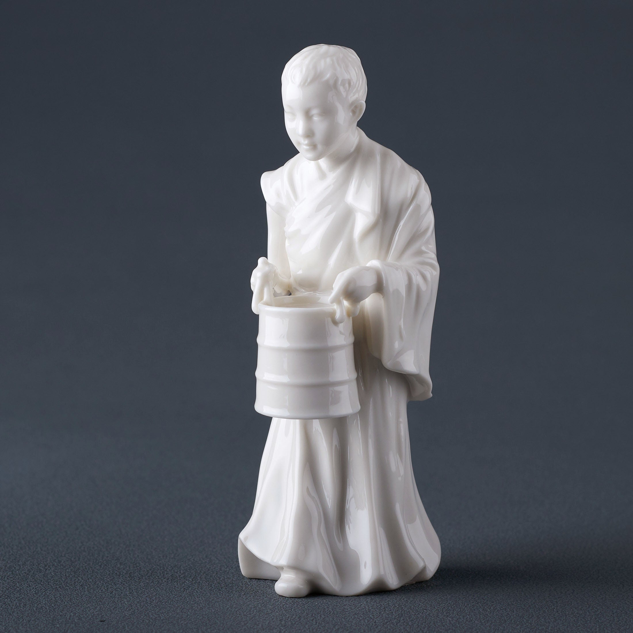 Tibet FigurineYoung Lama Holding A Bucket