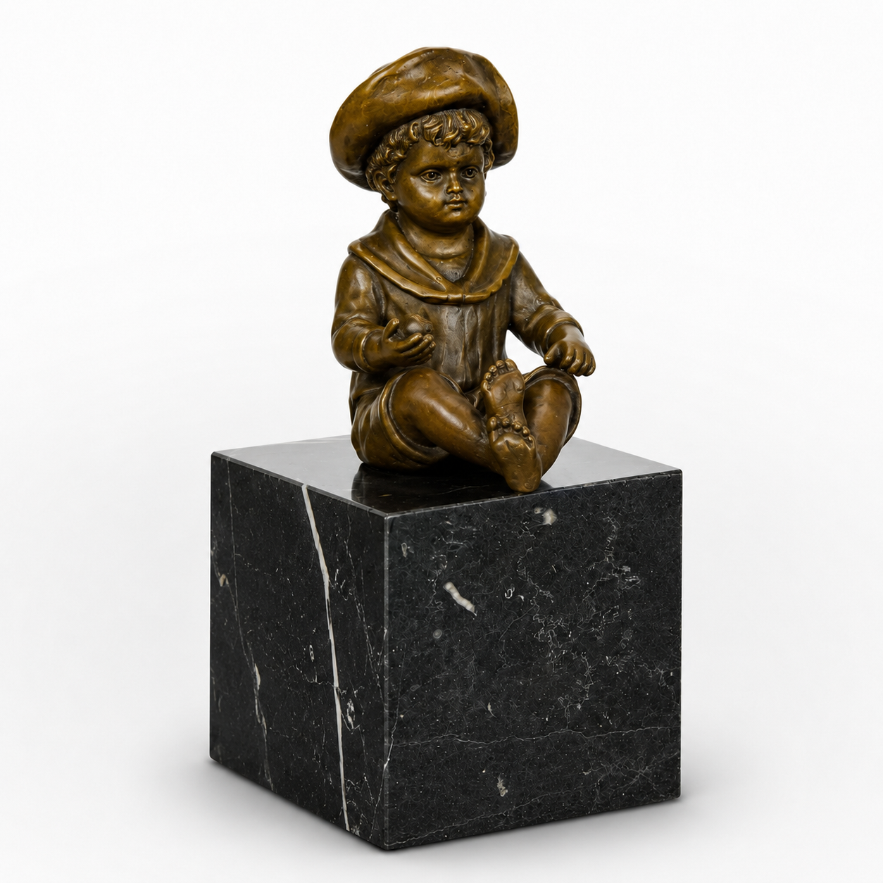 Bronze Sculpture of a Little Boy Sitting | Figurines & Statues