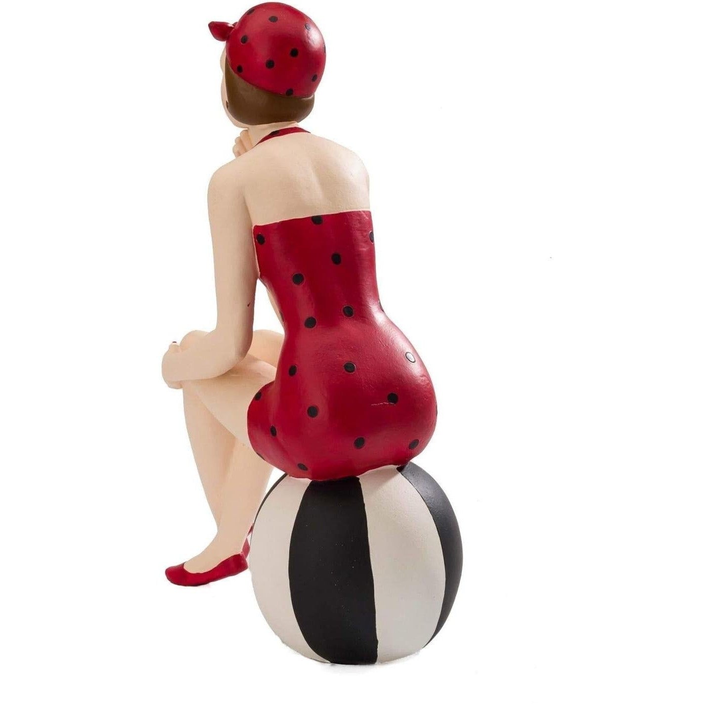 Figurine of Retro Lady in Red Swimsuit Sitting on Beach