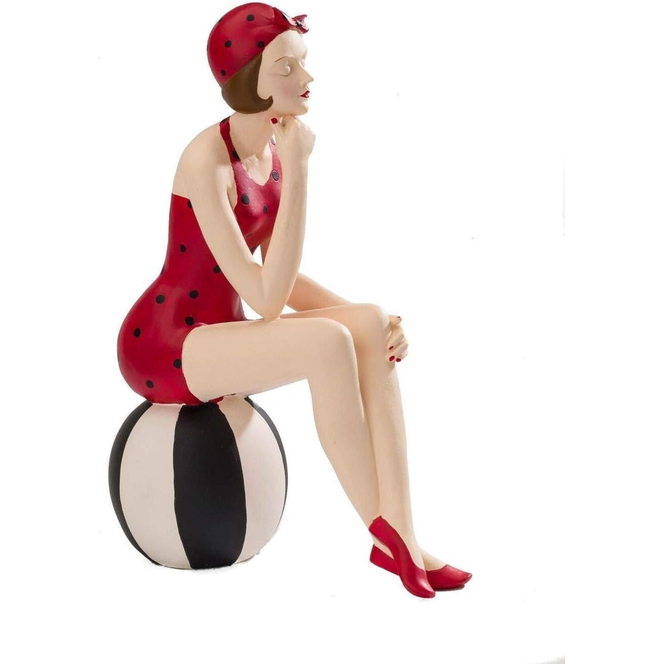 Figurine of Retro Lady in Red Swimsuit Sitting on Beach