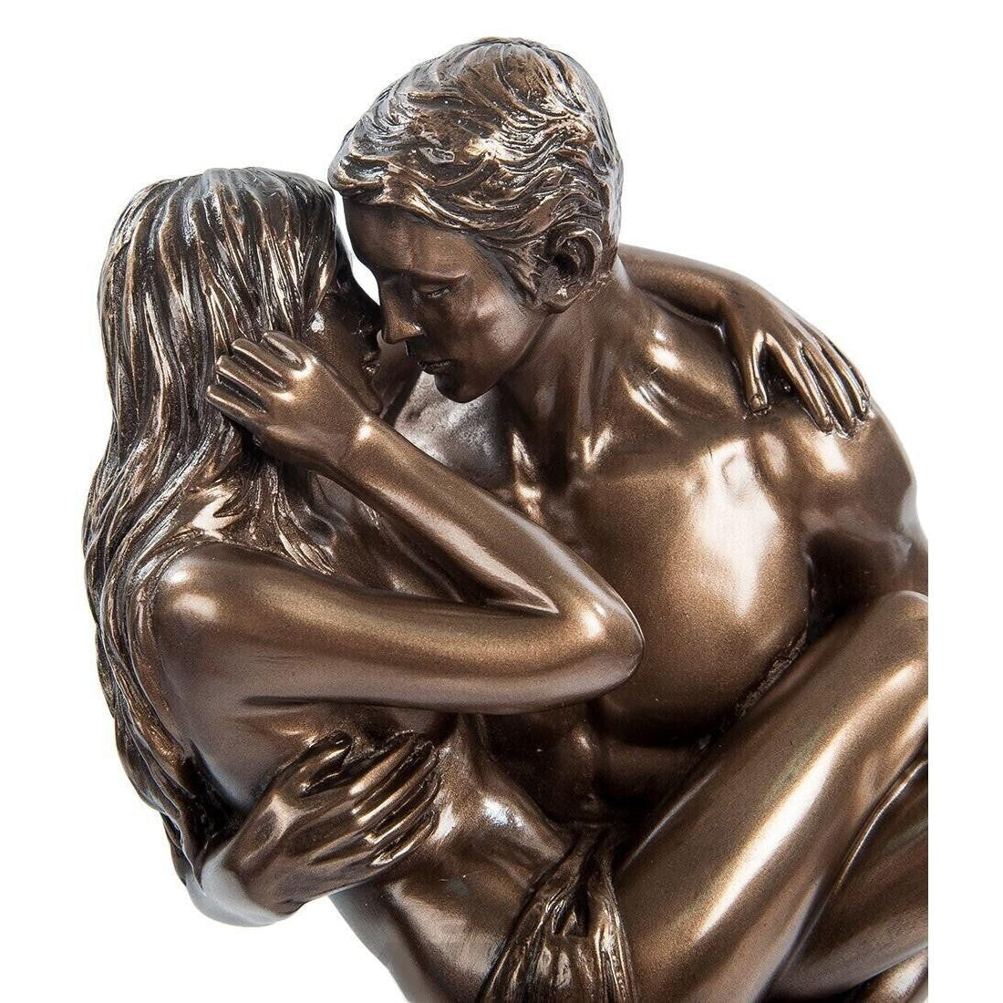 Lovers Statue. Man Lifting a Woman Sculpture. Man Carrying Woman