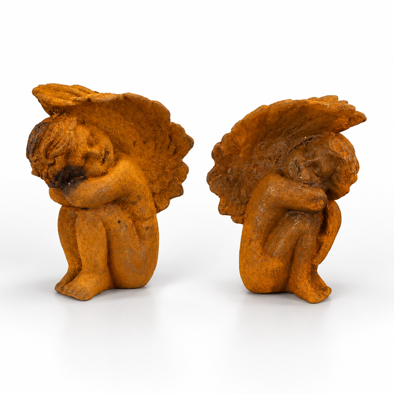 Pair of Rusty Cast Iron Putti Book-ends | Curios & Collectibles
