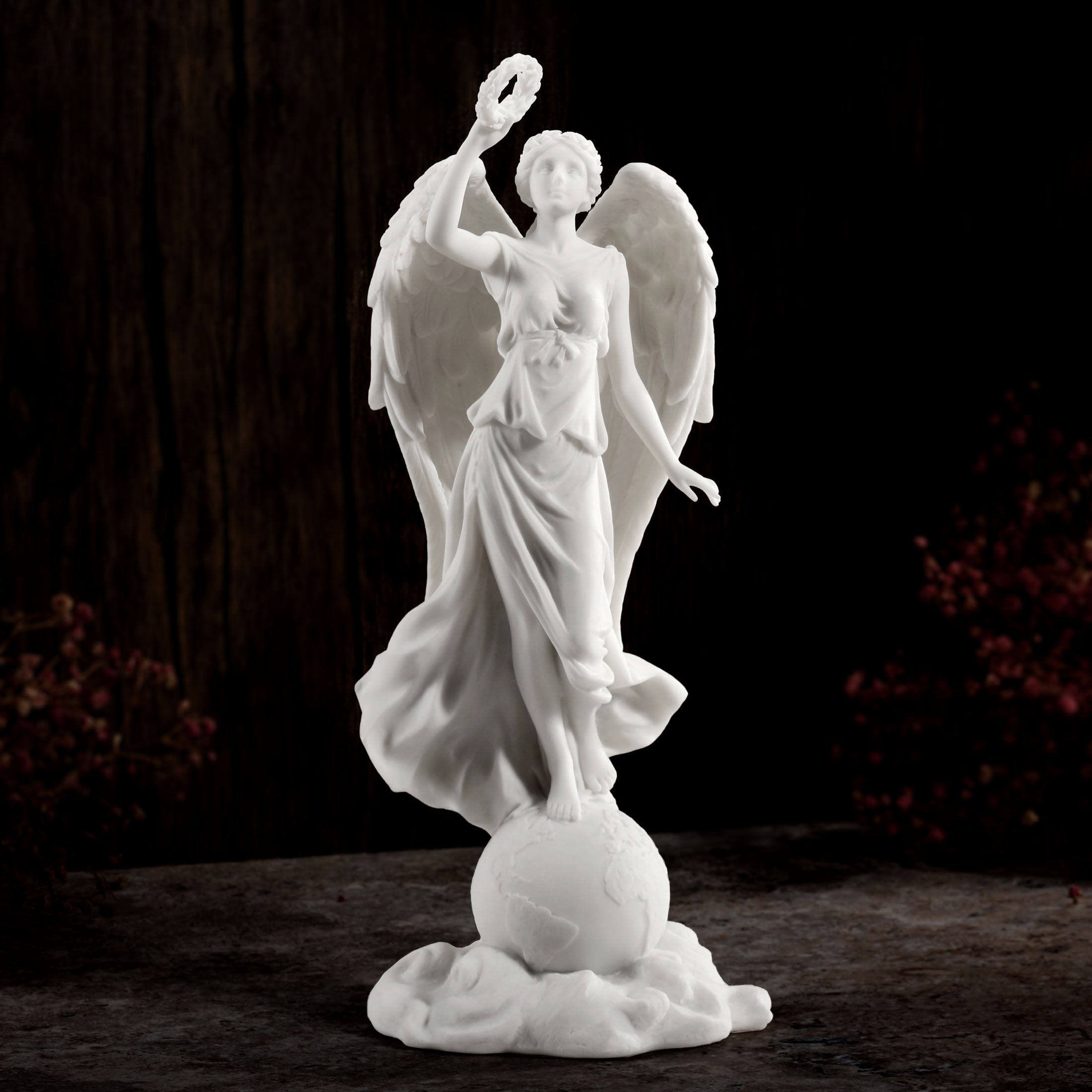 Angel Holding Wreath Standing On Earth