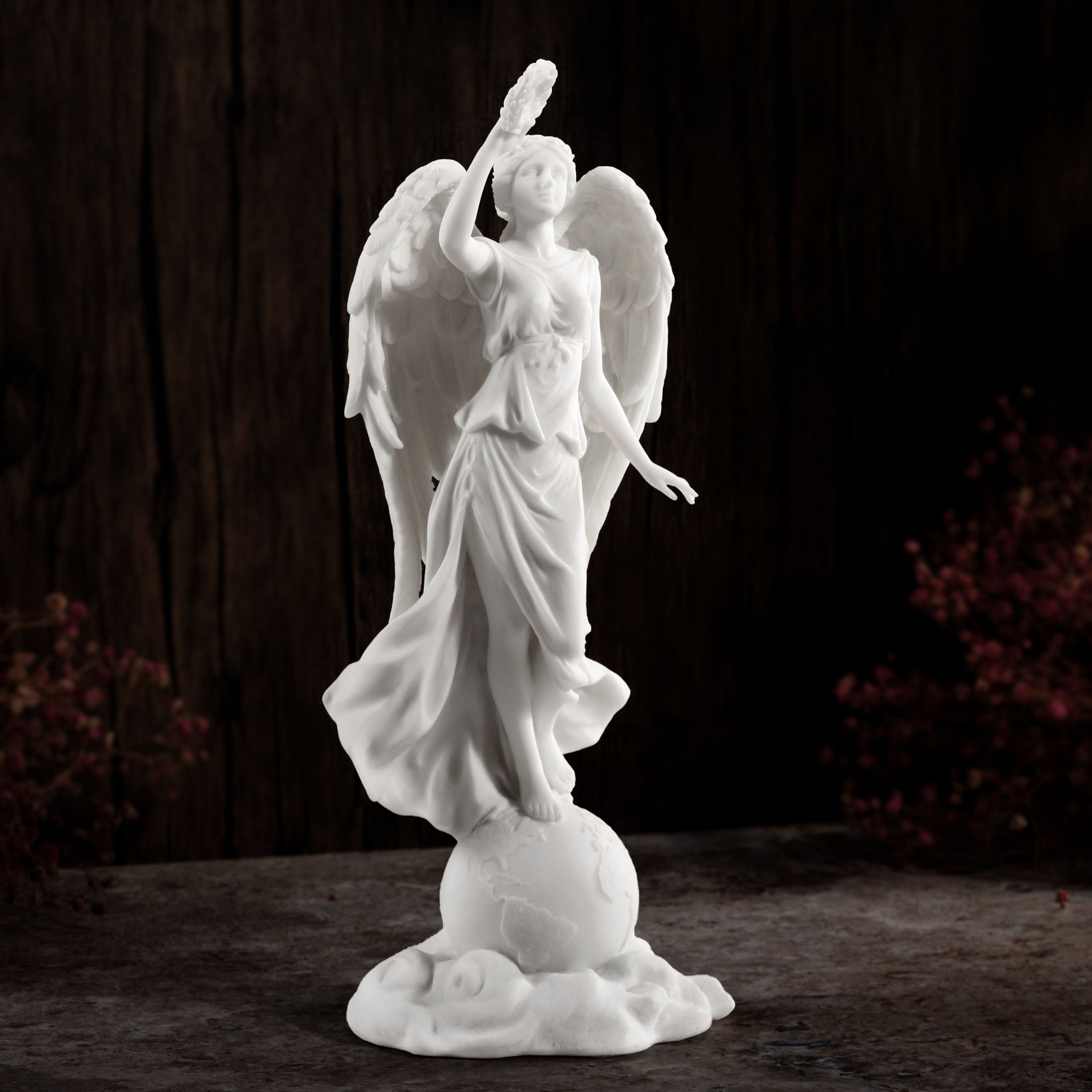 Angel Holding Wreath Standing On Earth