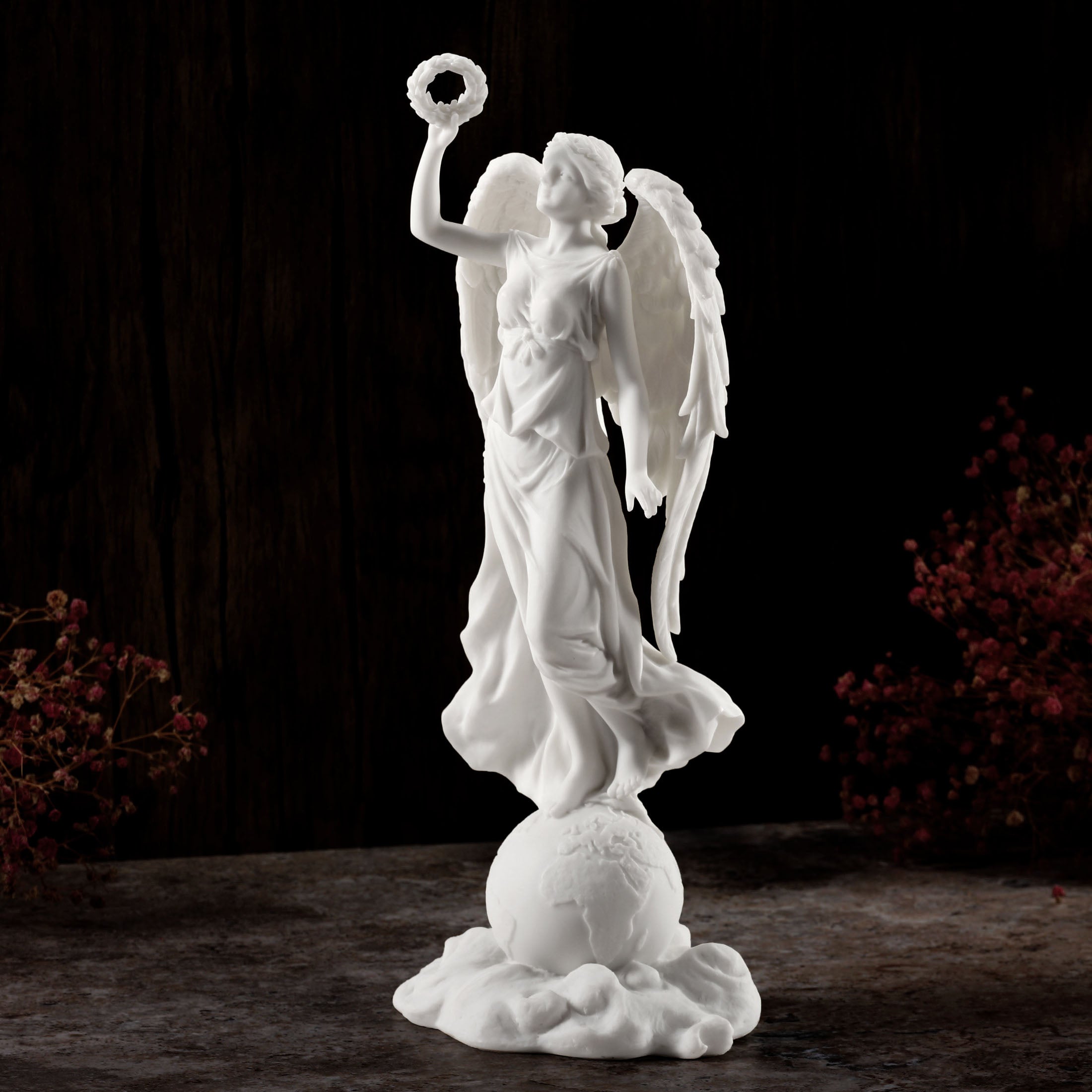 Angel Holding Wreath Standing On Earth